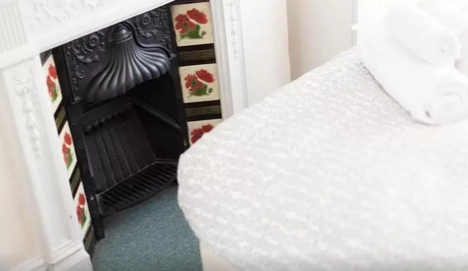 Bed in Home2Home-Rooms