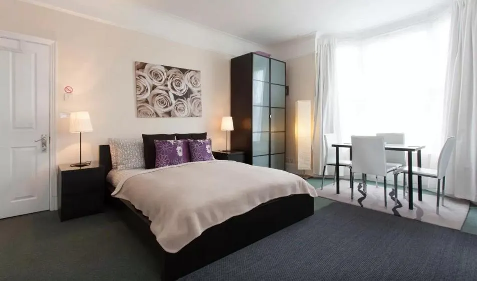 Bed in Home2Home-Rooms