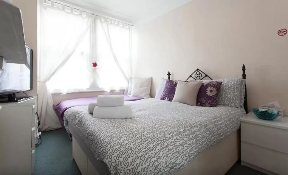 Bed in Home2Home-Rooms