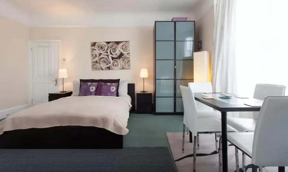 Bed in Home2Home-Rooms