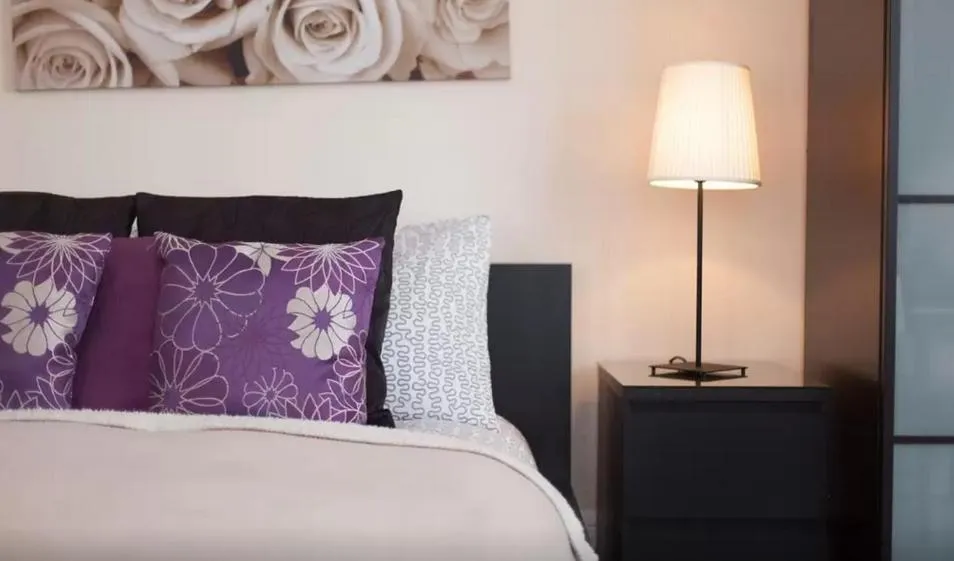 Bed in Home2Home-Rooms