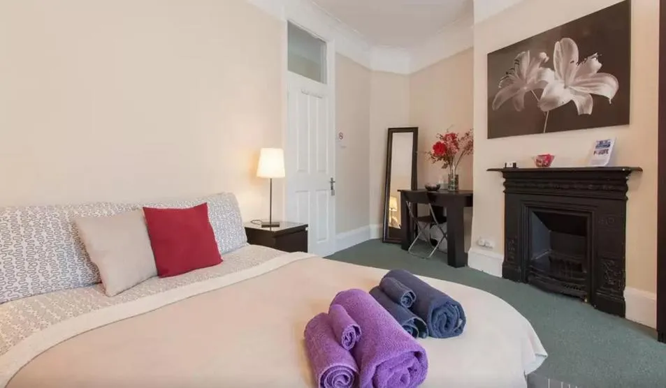 Bed in Home2Home-Rooms