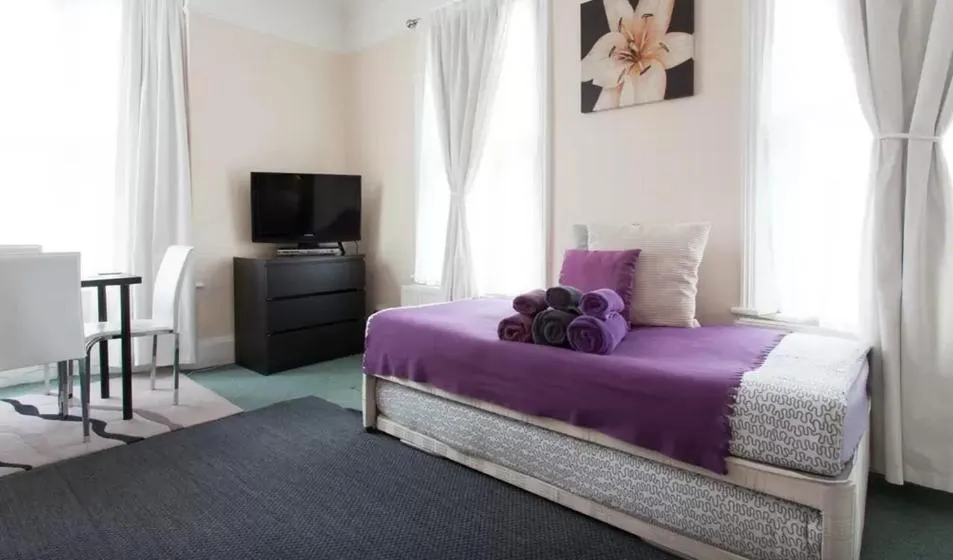 Bed in Home2Home-Rooms