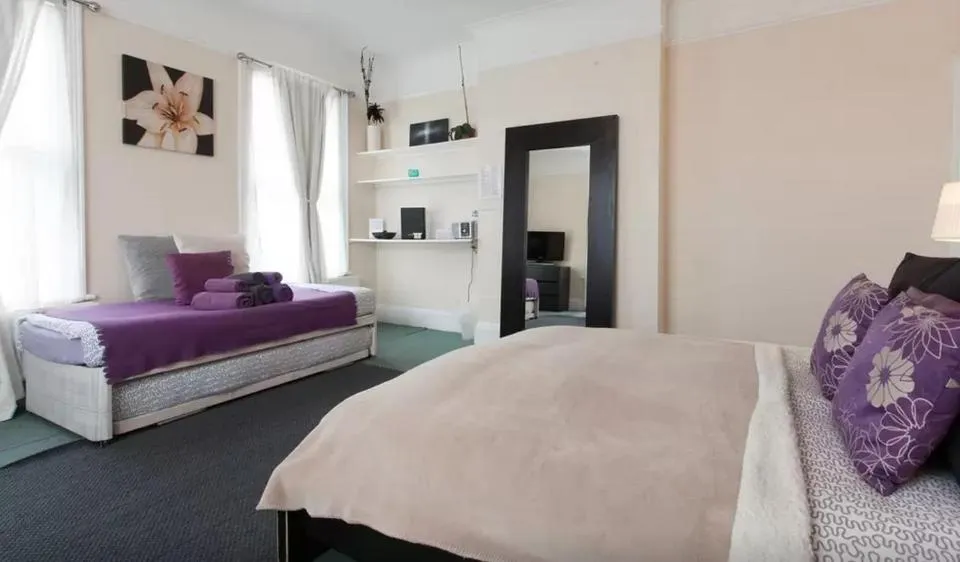 Bed in Home2Home-Rooms