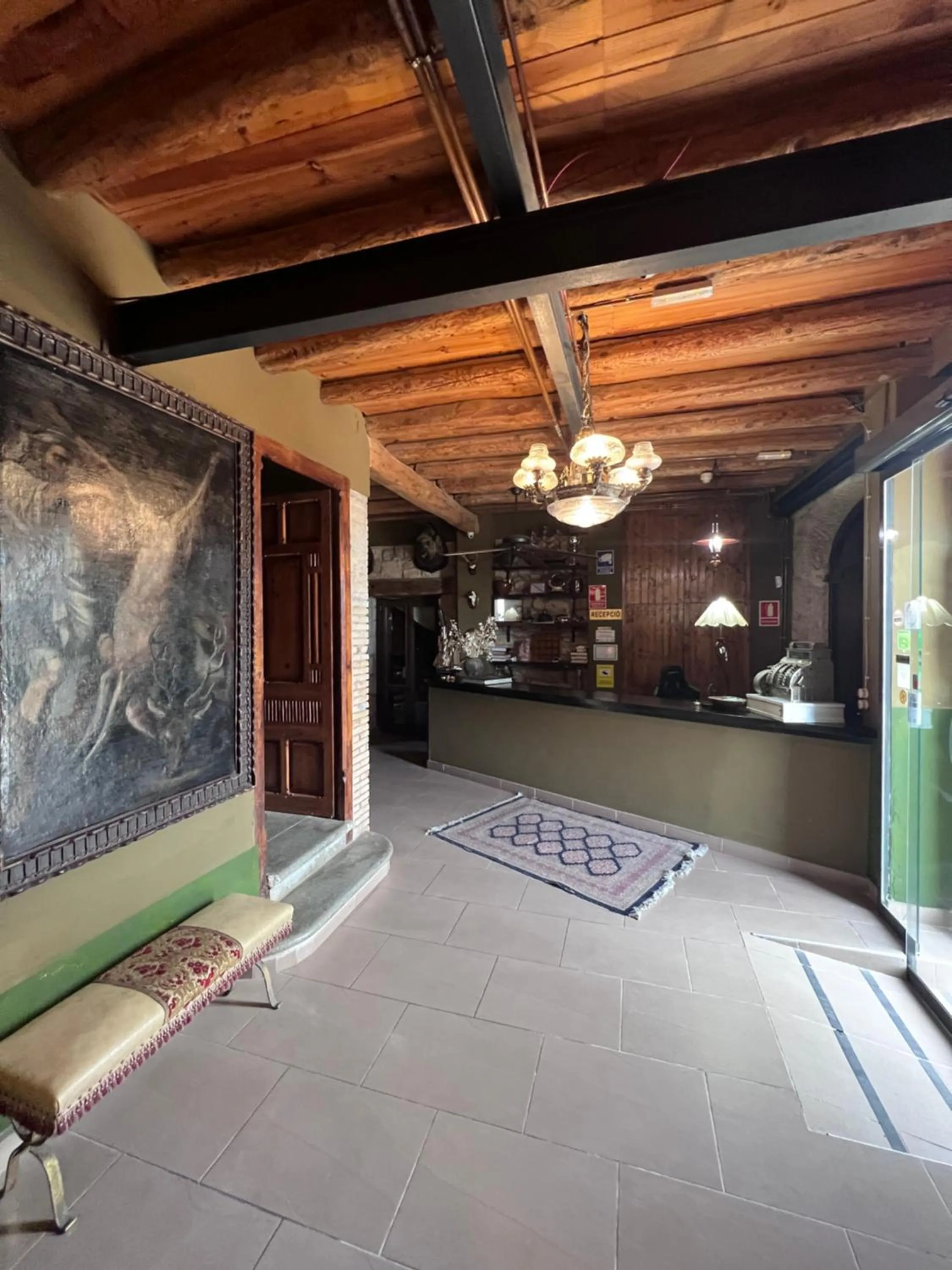 Lobby or reception in La Garbinada Hotel