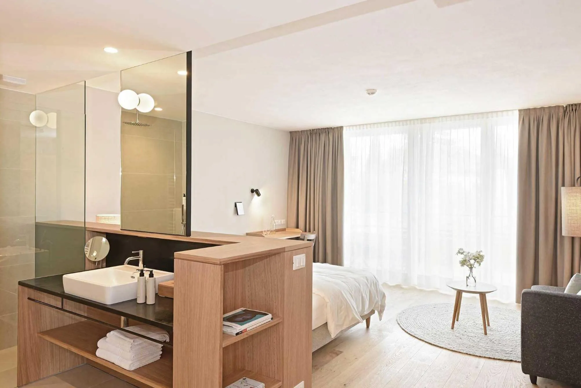 Bed in Hotel Schwarzschmied, a Member of Design Hotels