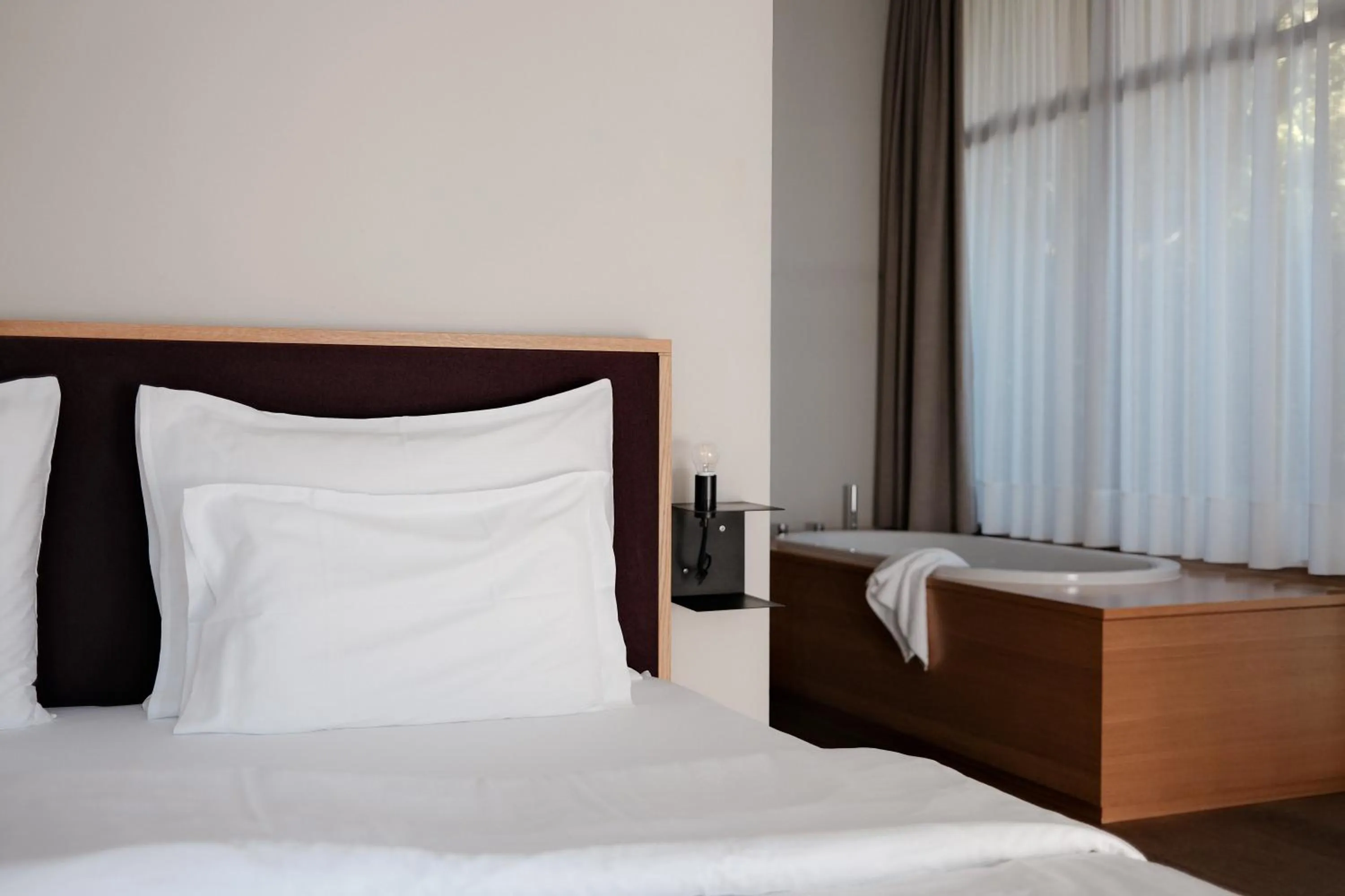 Bedroom, Bed in Hotel Schwarzschmied, a Member of Design Hotels