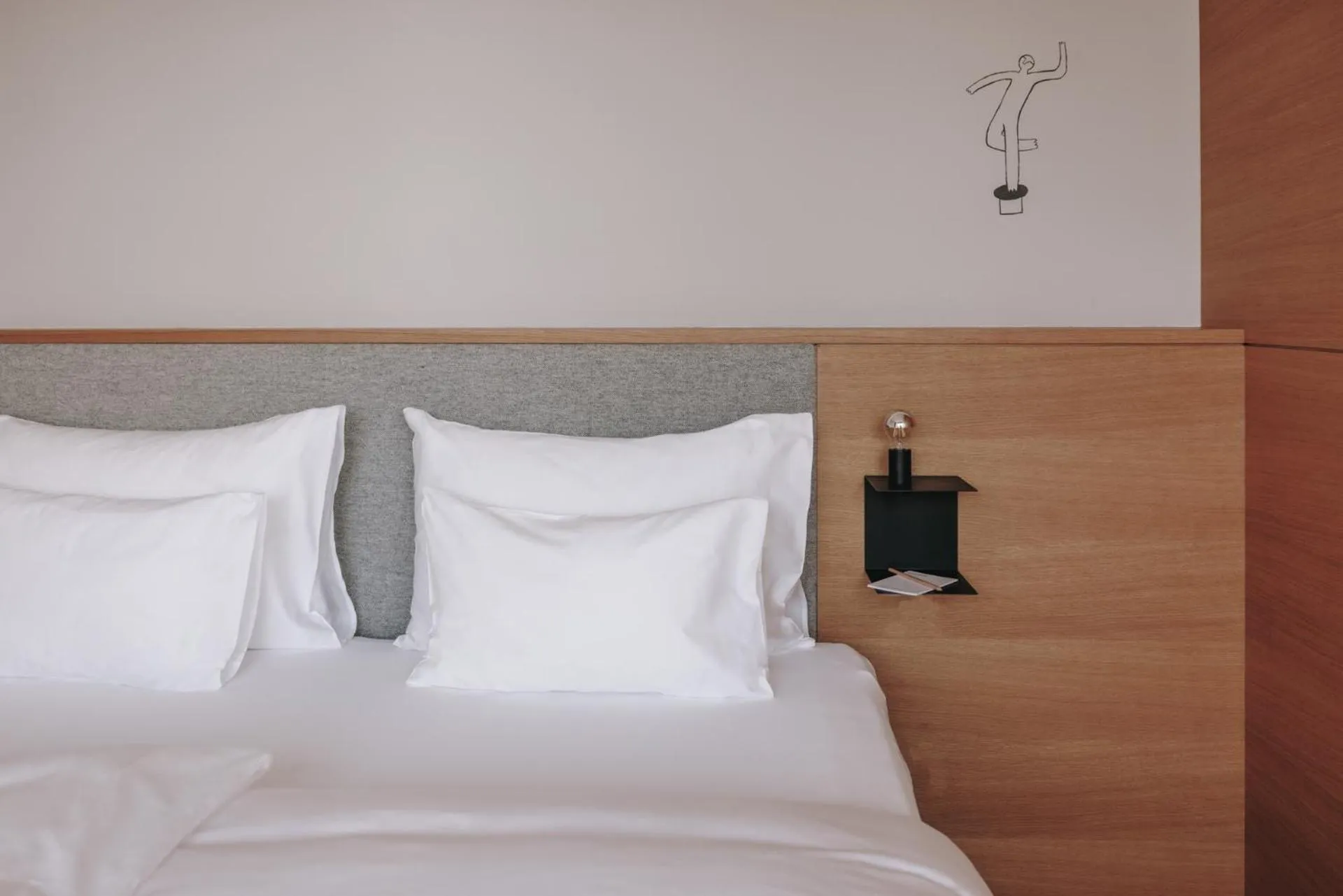 Bed in Hotel Schwarzschmied, a Member of Design Hotels
