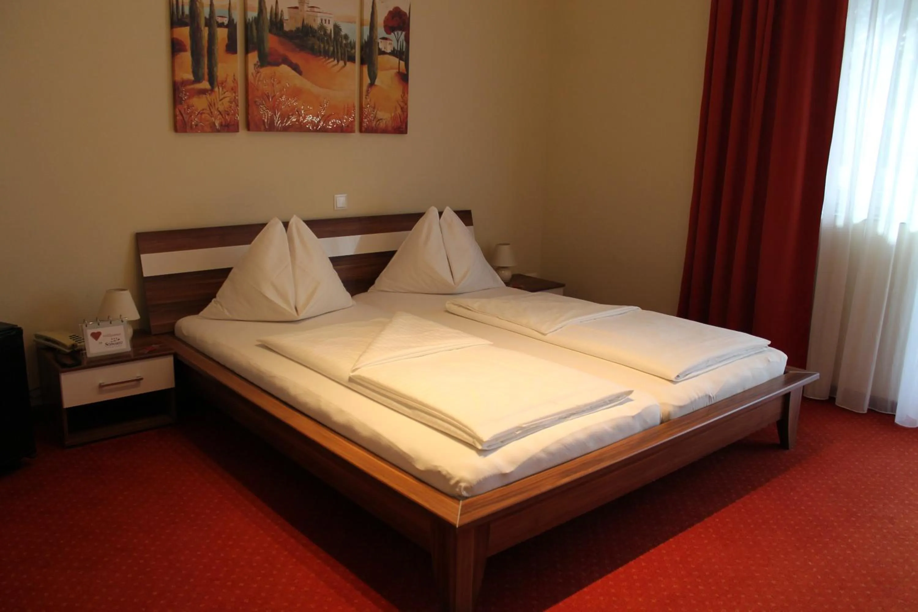 Bed in Hotel Restaurant Schwartz