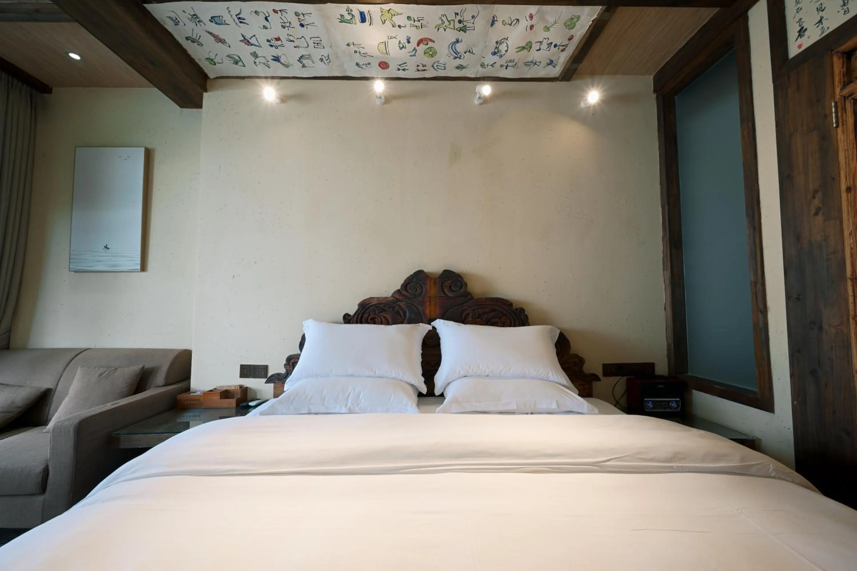 Bed in Old Story Inn Lijiang Old Town