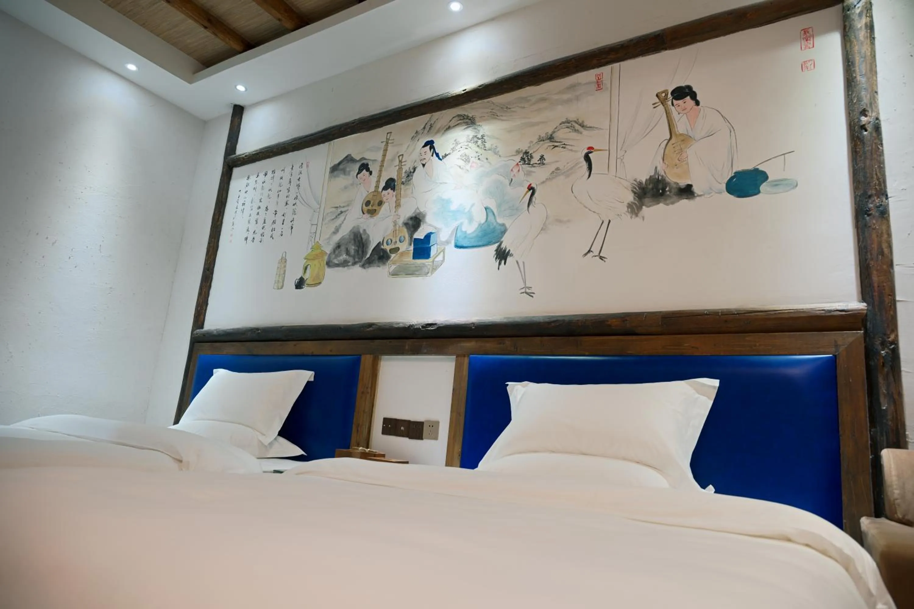 Bed in Old Story Inn Lijiang Old Town