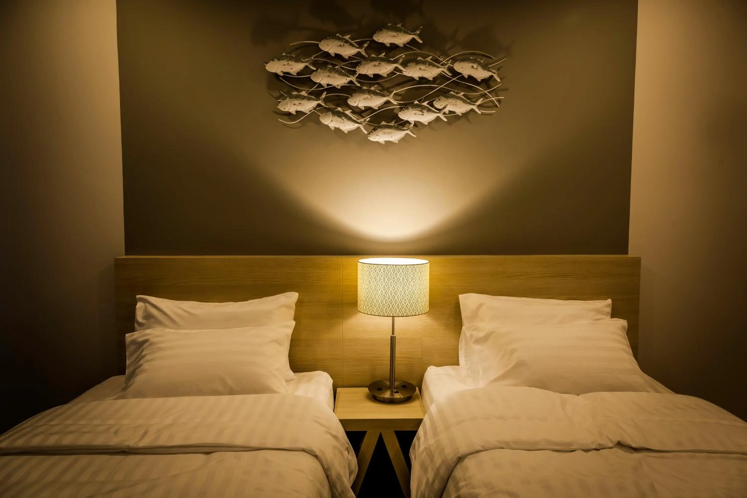 Bed in Triple Z Hotel