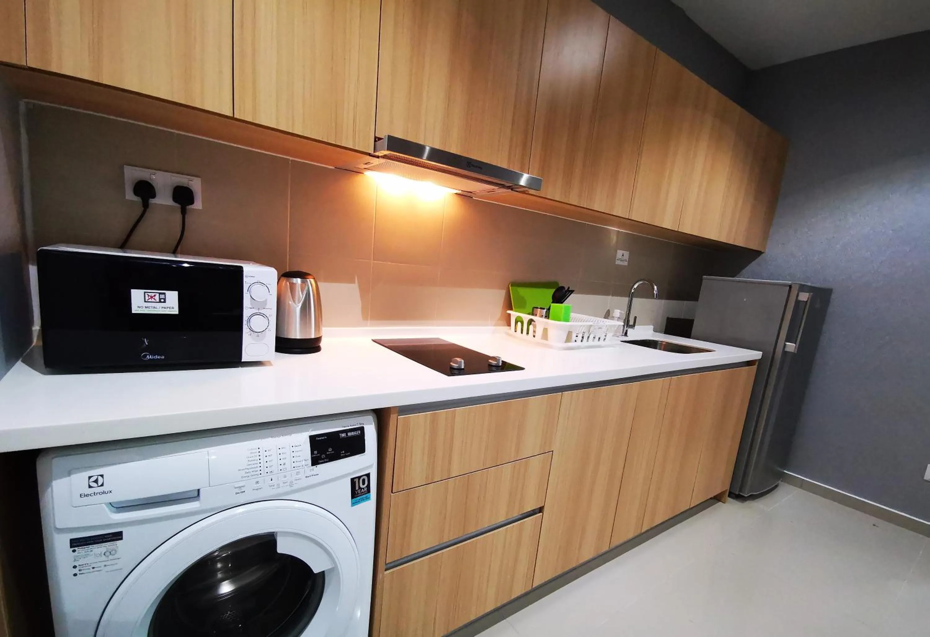 Kitchen or kitchenette in Host Assist Homestay by HA i-City