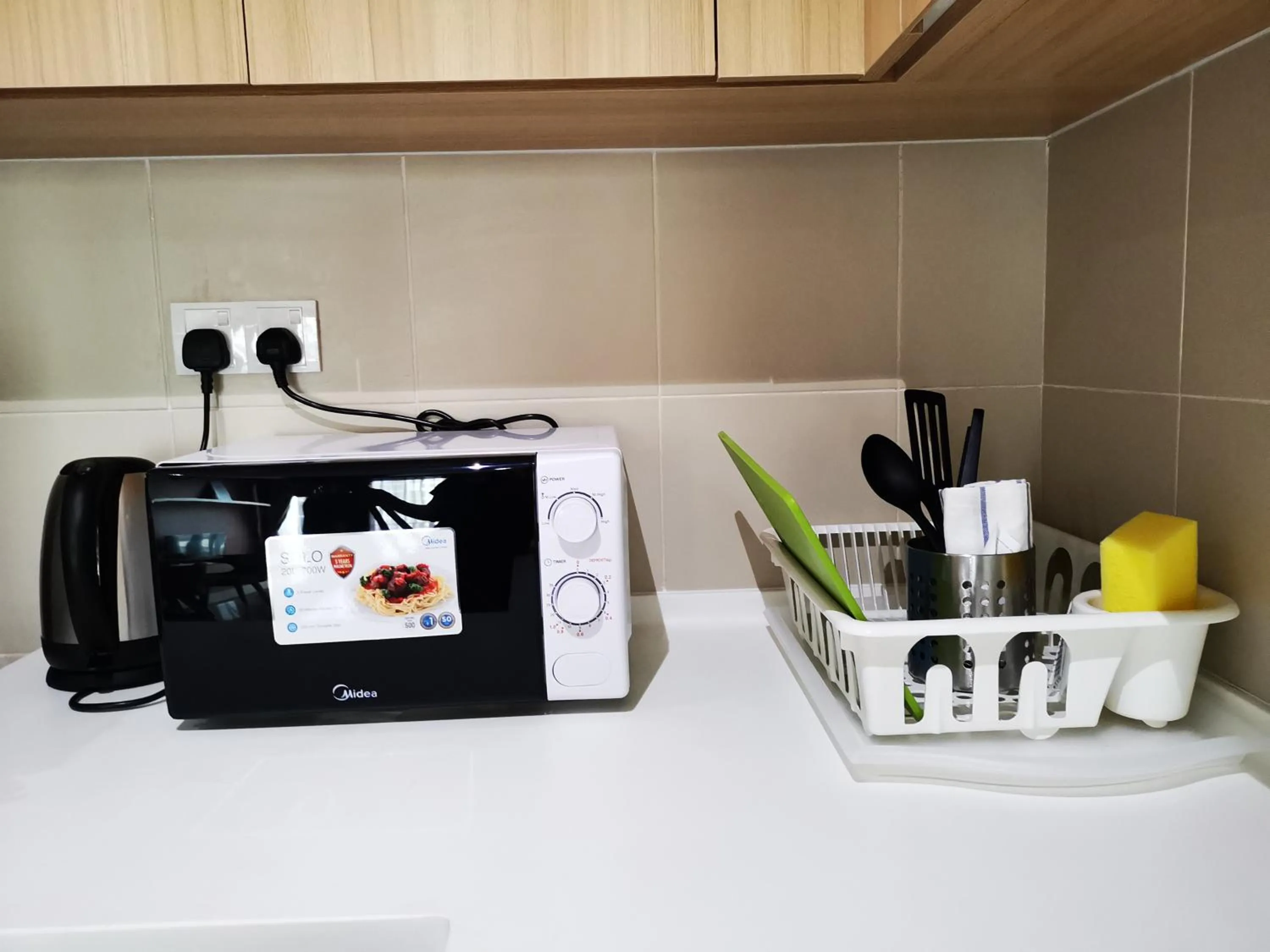 Kitchen or kitchenette in Host Assist Homestay by HA i-City