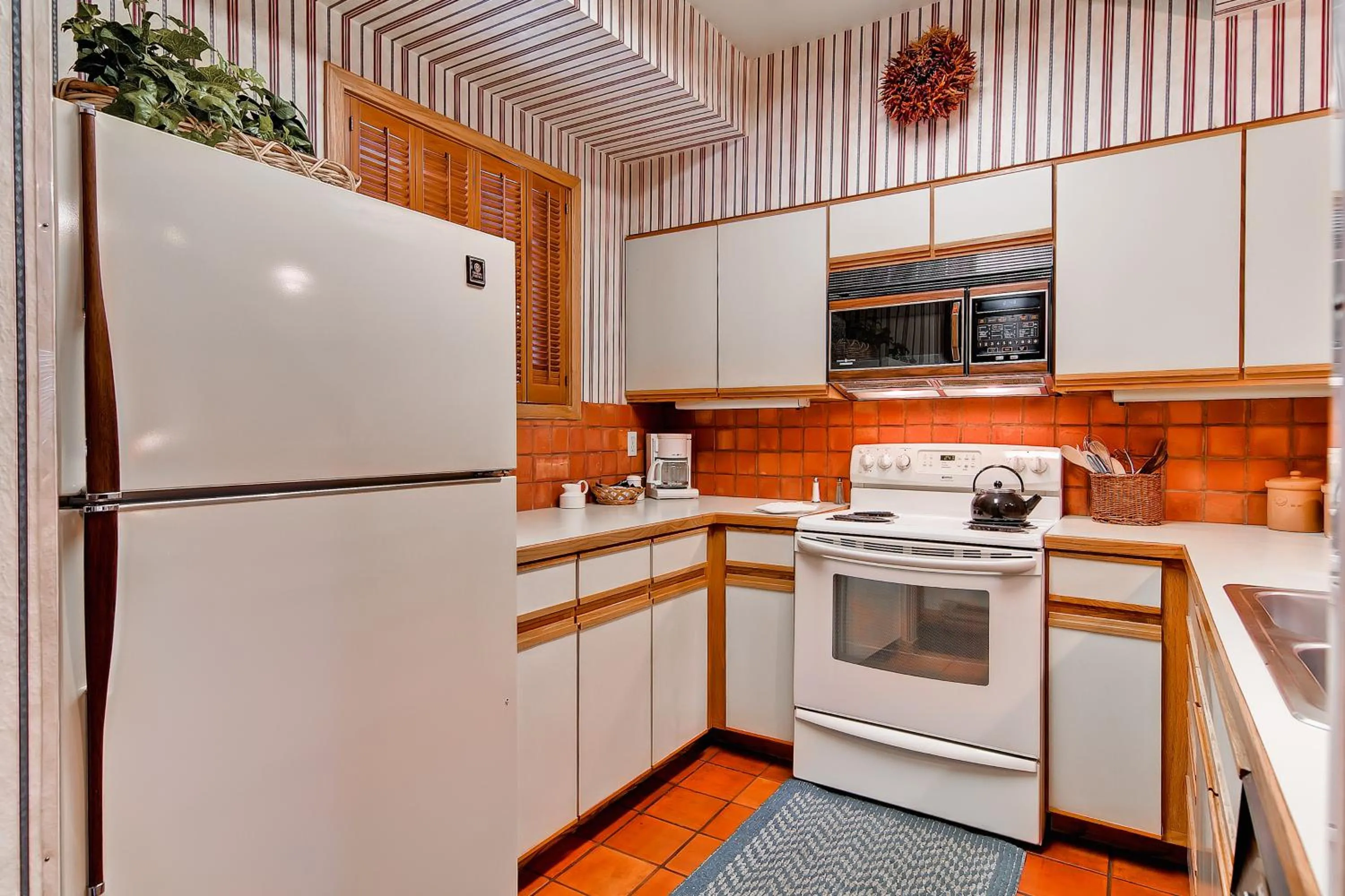 Kitchen or kitchenette in Snow Flower Condos