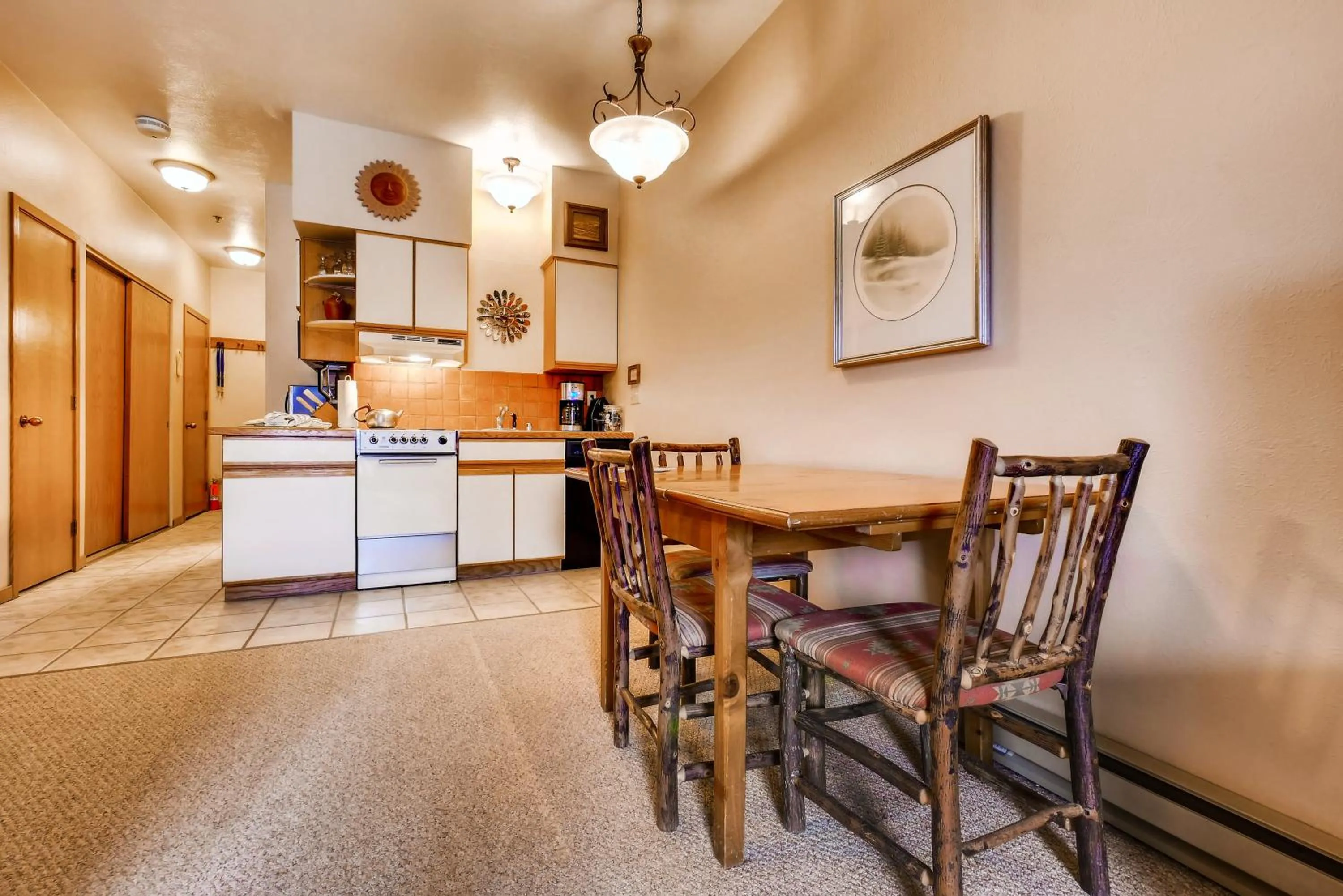 Kitchen or kitchenette in Snow Flower Condos