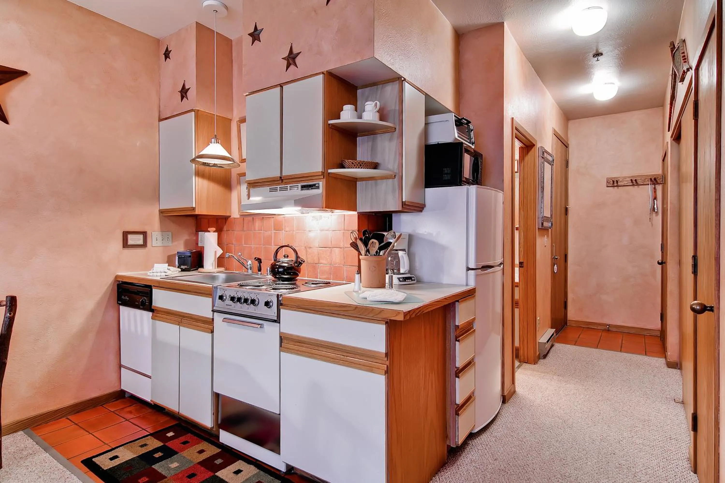 Kitchen or kitchenette in Snow Flower Condos