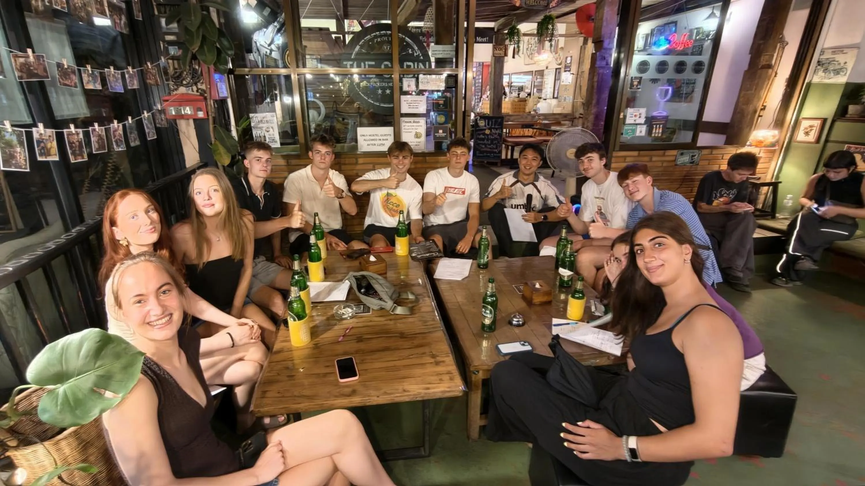 Communal lounge/ TV room in The Cabin Backpackers Hostel & Bar