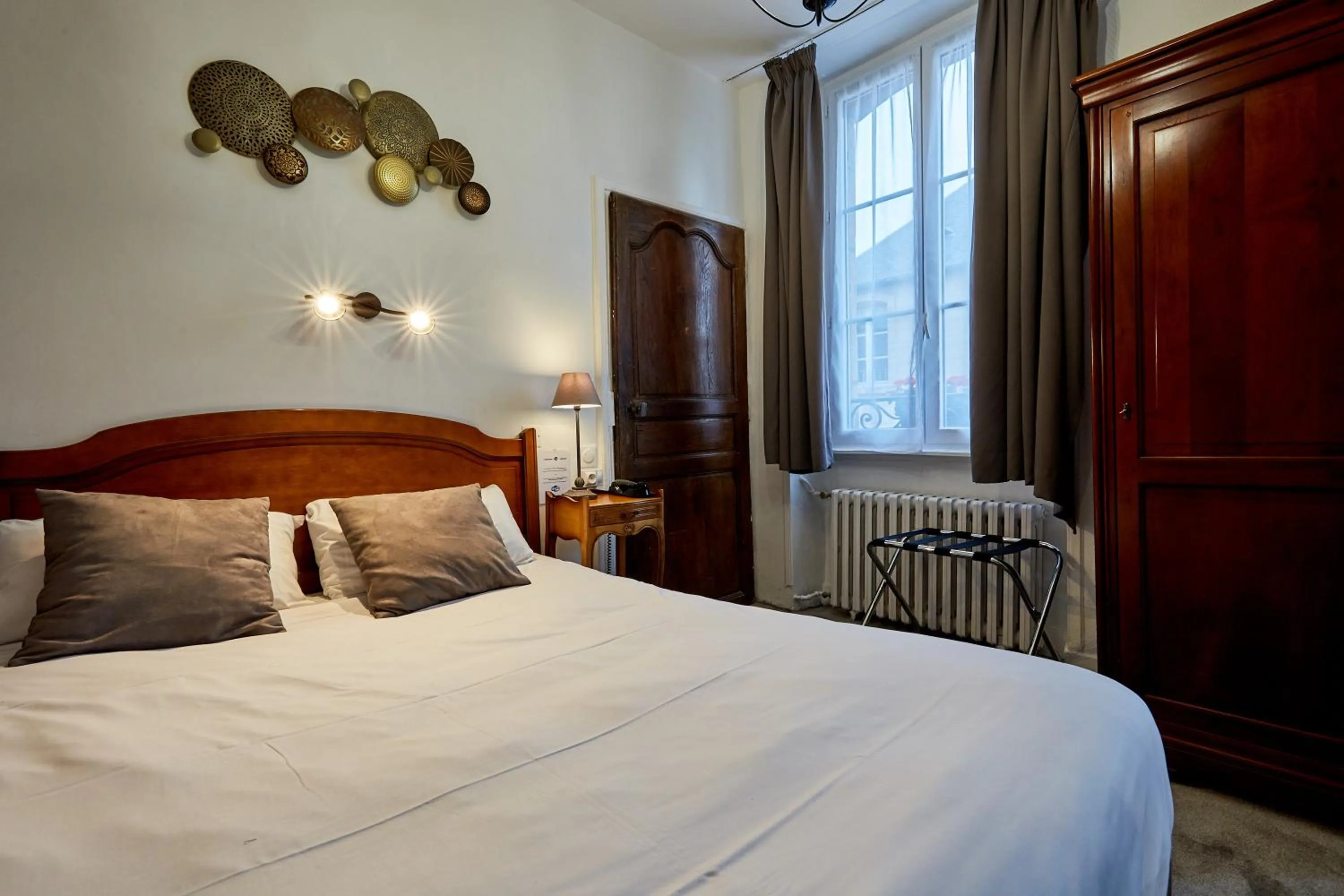 Photo of the whole room, Bed in Hotel Saint Etienne