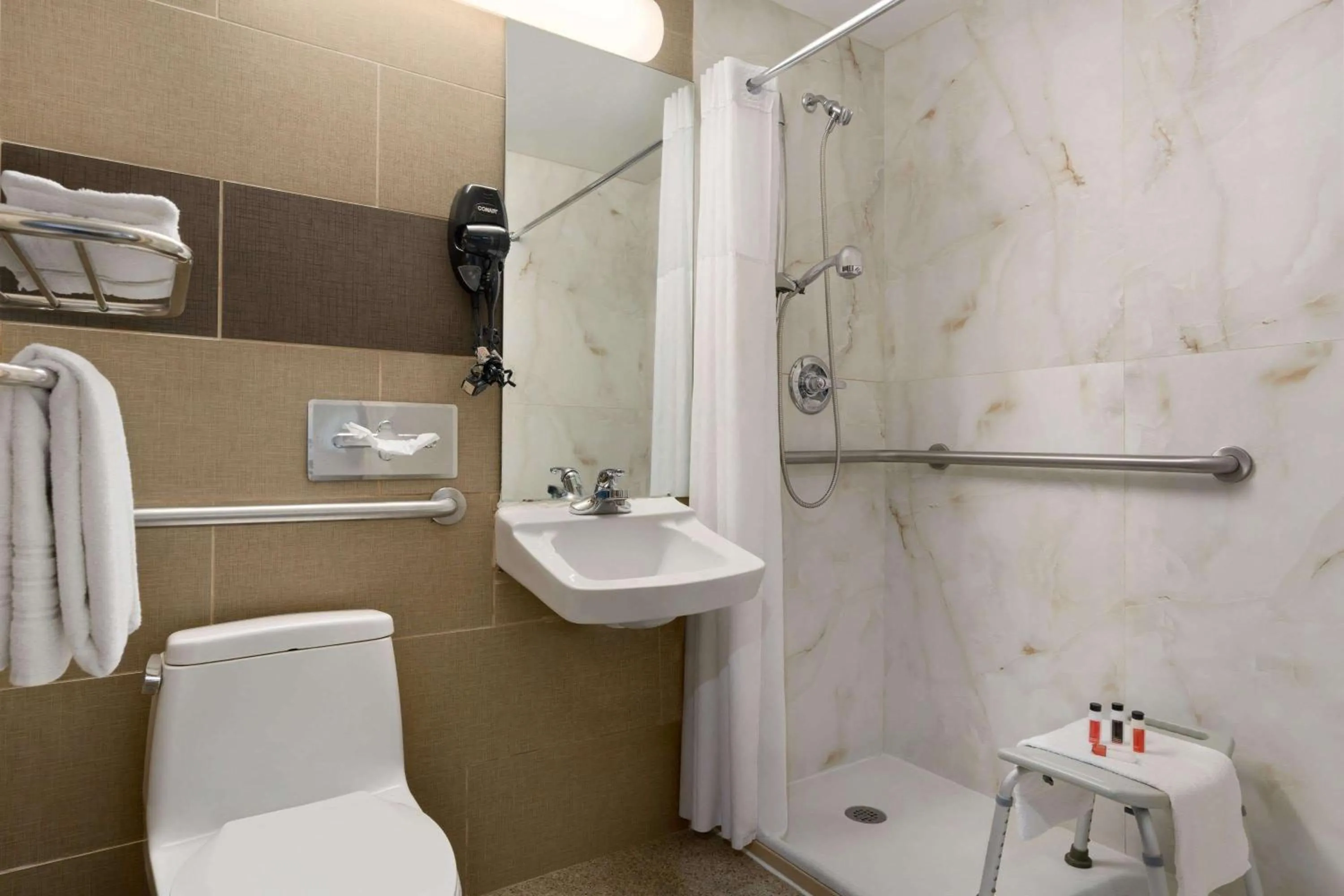 Bathroom in Days Inn by Wyndham Brooklyn