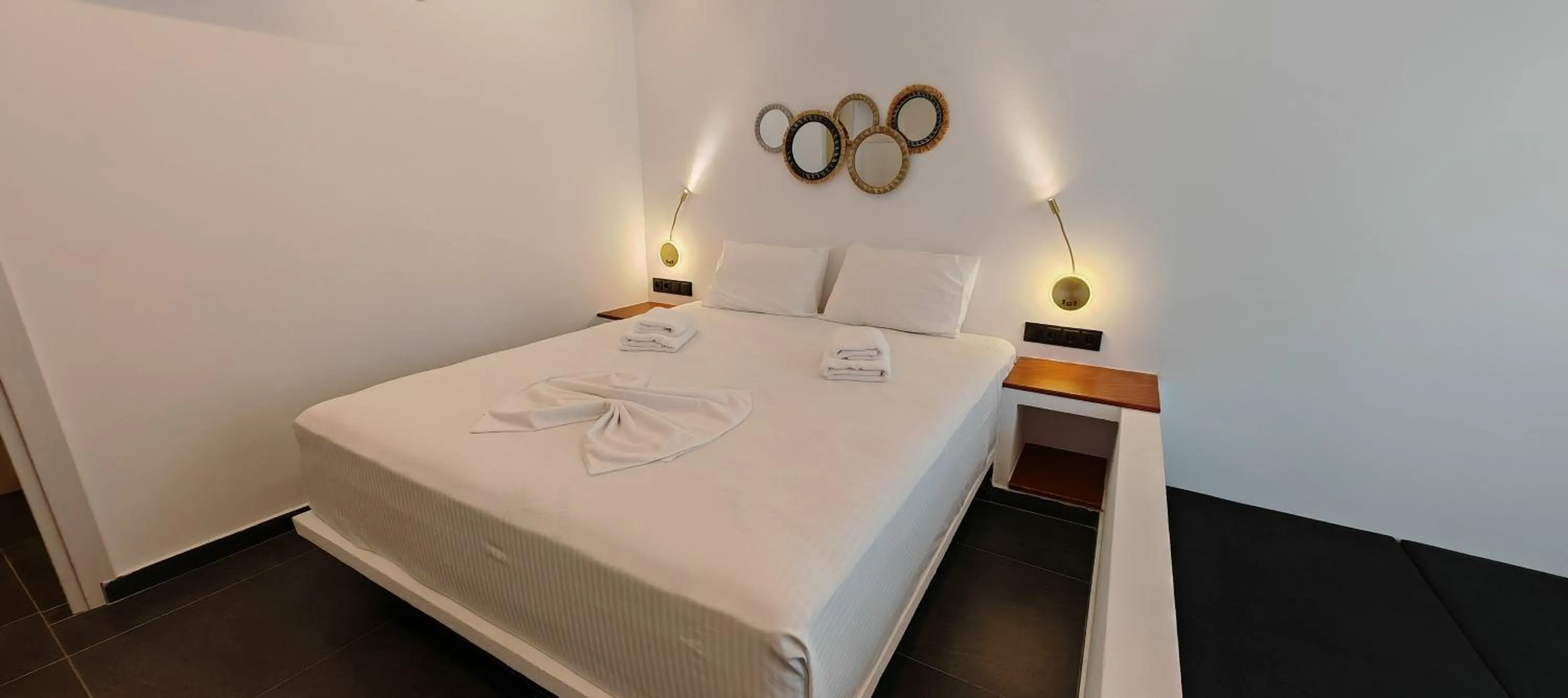 Bed in Rigas Hotel Skopelos