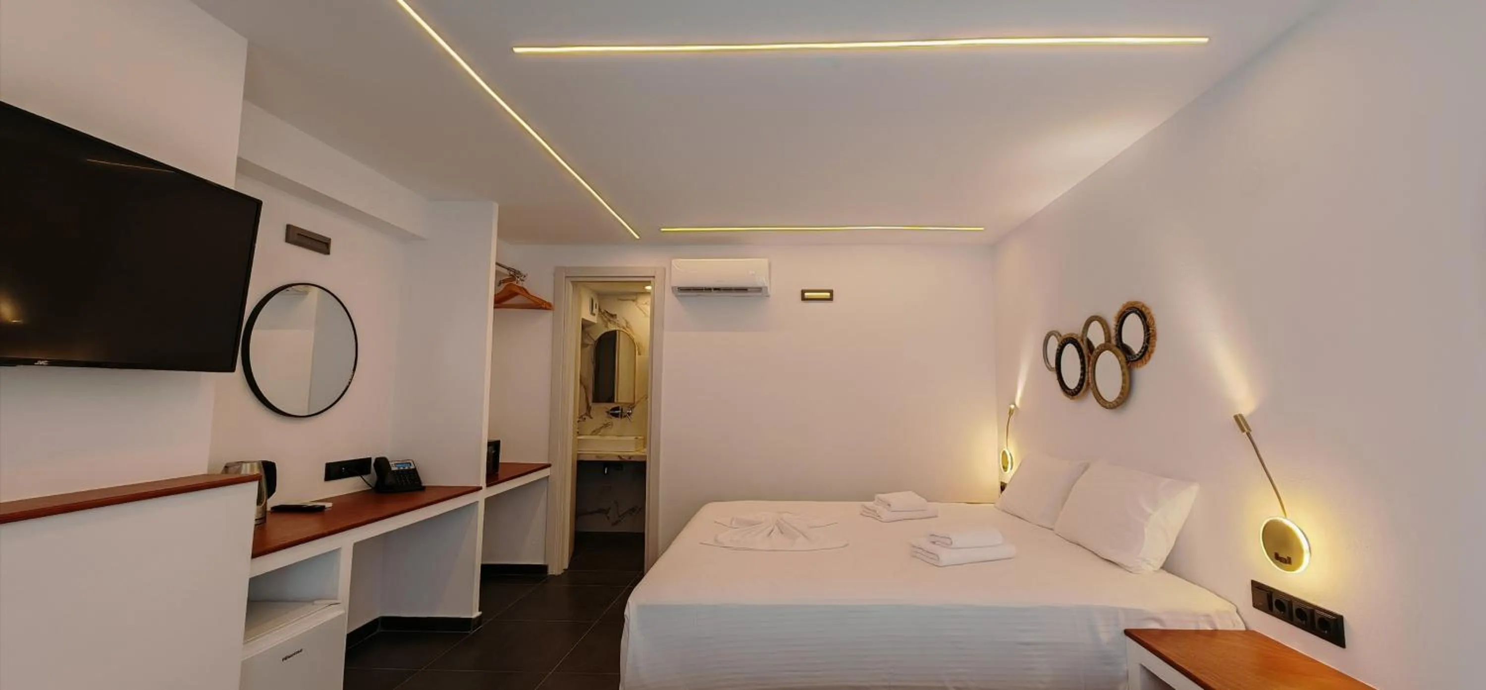 Bed in Rigas Hotel Skopelos