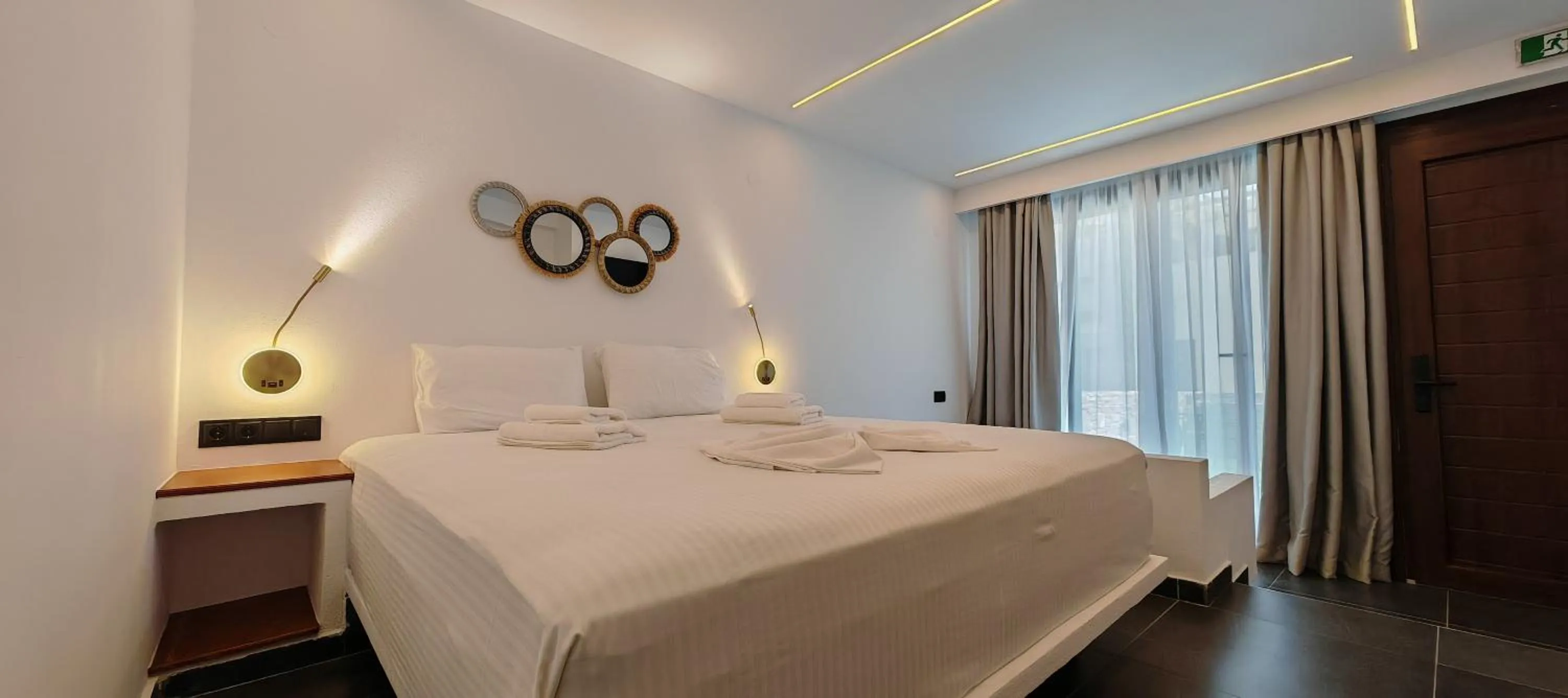 Bed in Rigas Hotel Skopelos