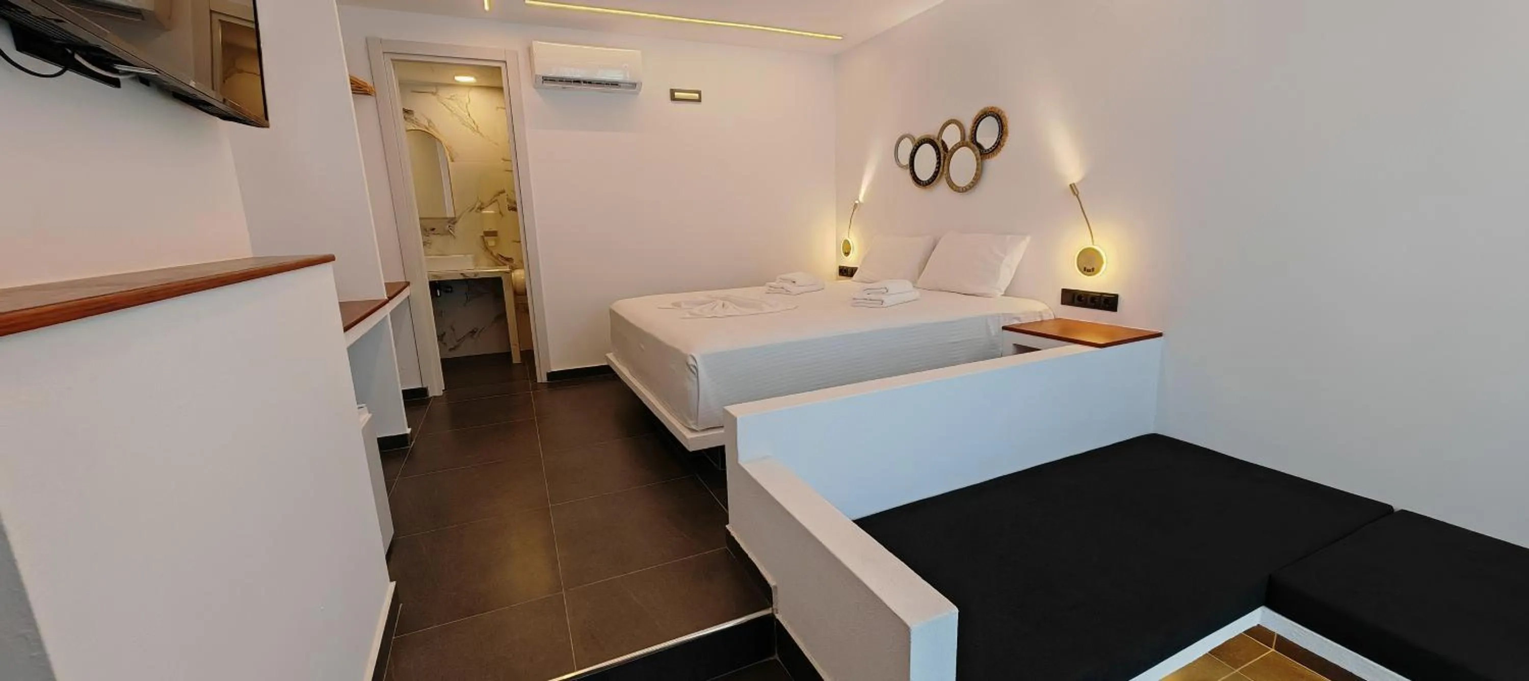 Bed in Rigas Hotel Skopelos