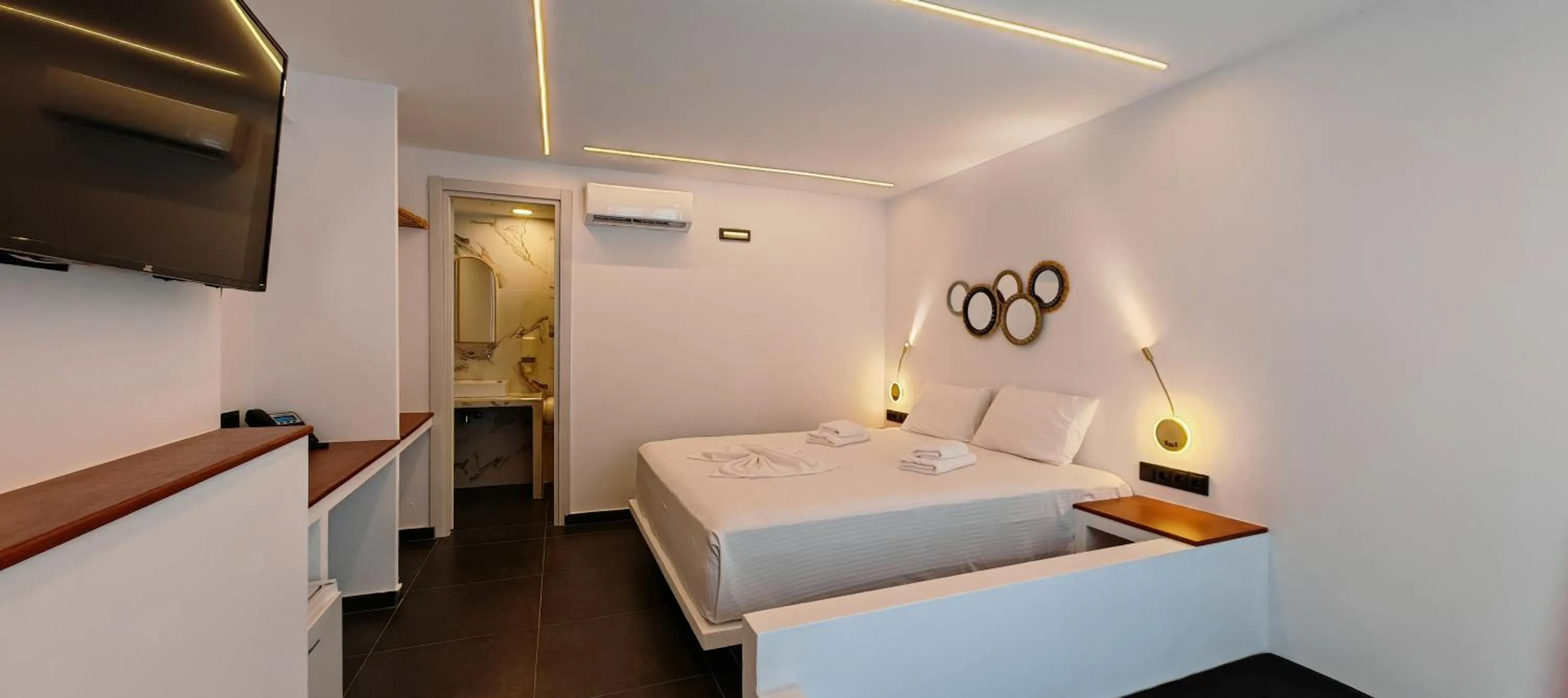 Bed in Rigas Hotel Skopelos