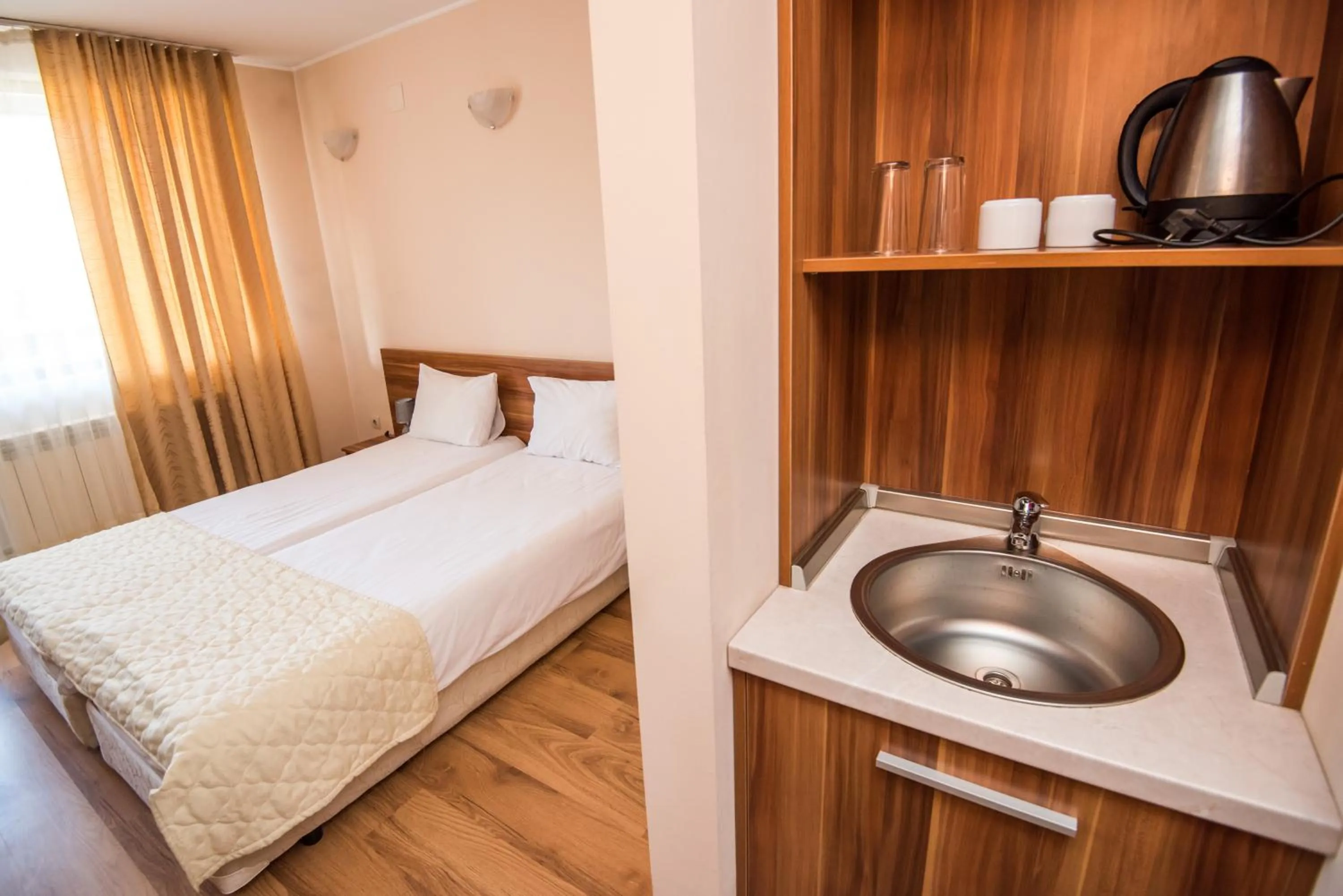 Coffee/tea facilities, Bed in Apart Hotel Orbilux