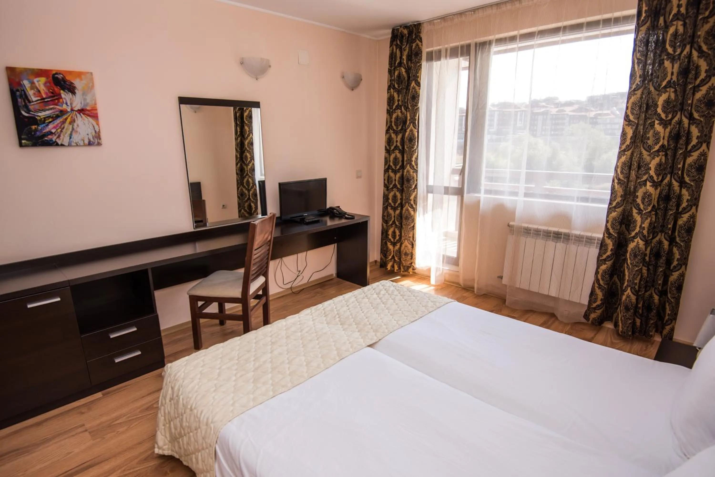 Communal lounge/ TV room, Bed in Apart Hotel Orbilux