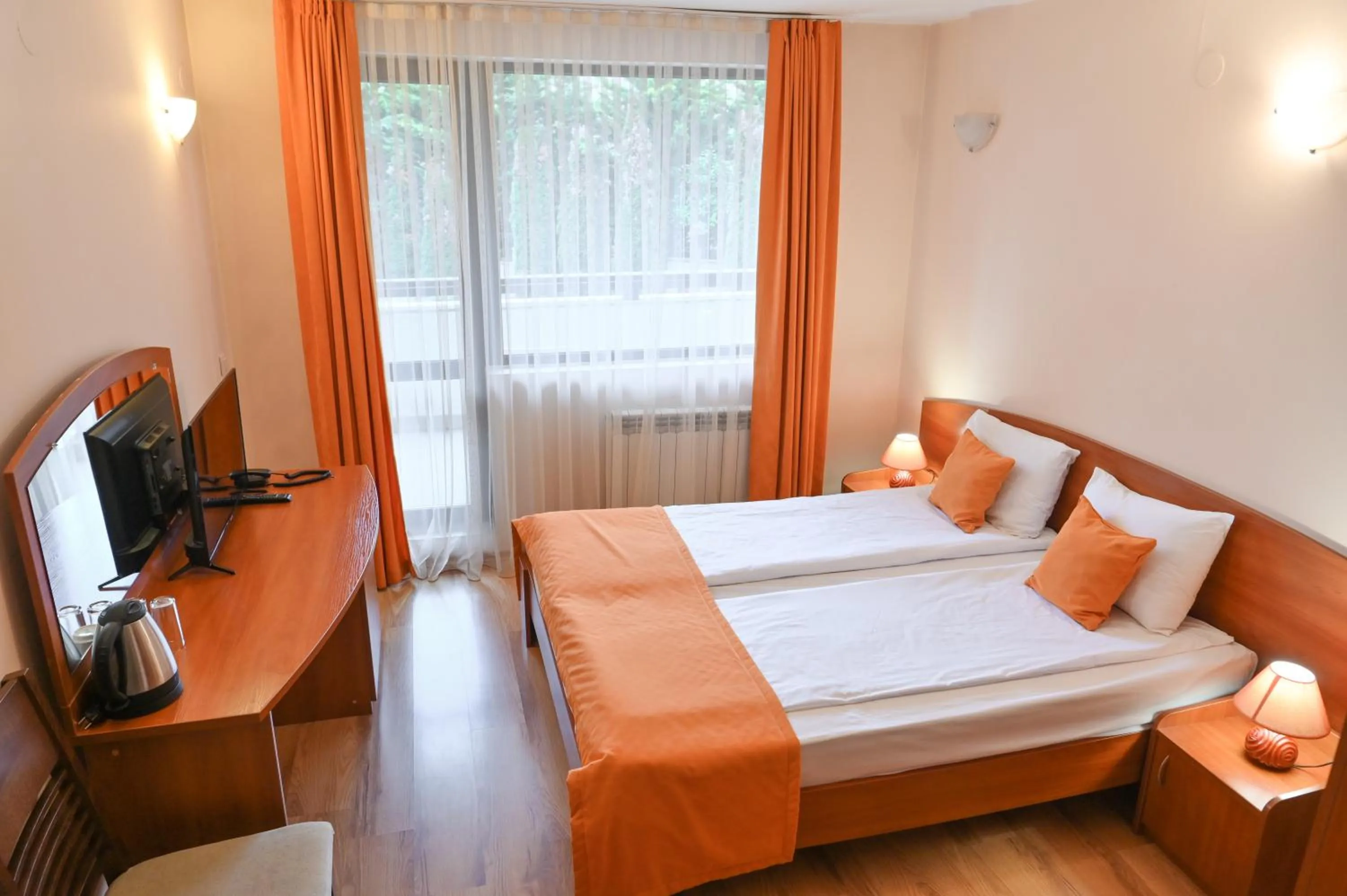 Bed in Apart Hotel Orbilux