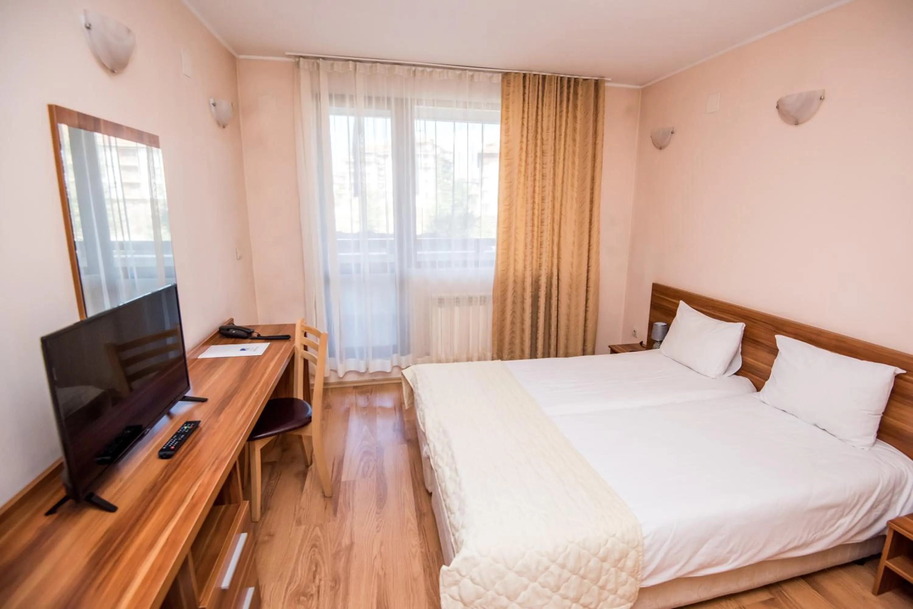 Bed in Apart Hotel Orbilux