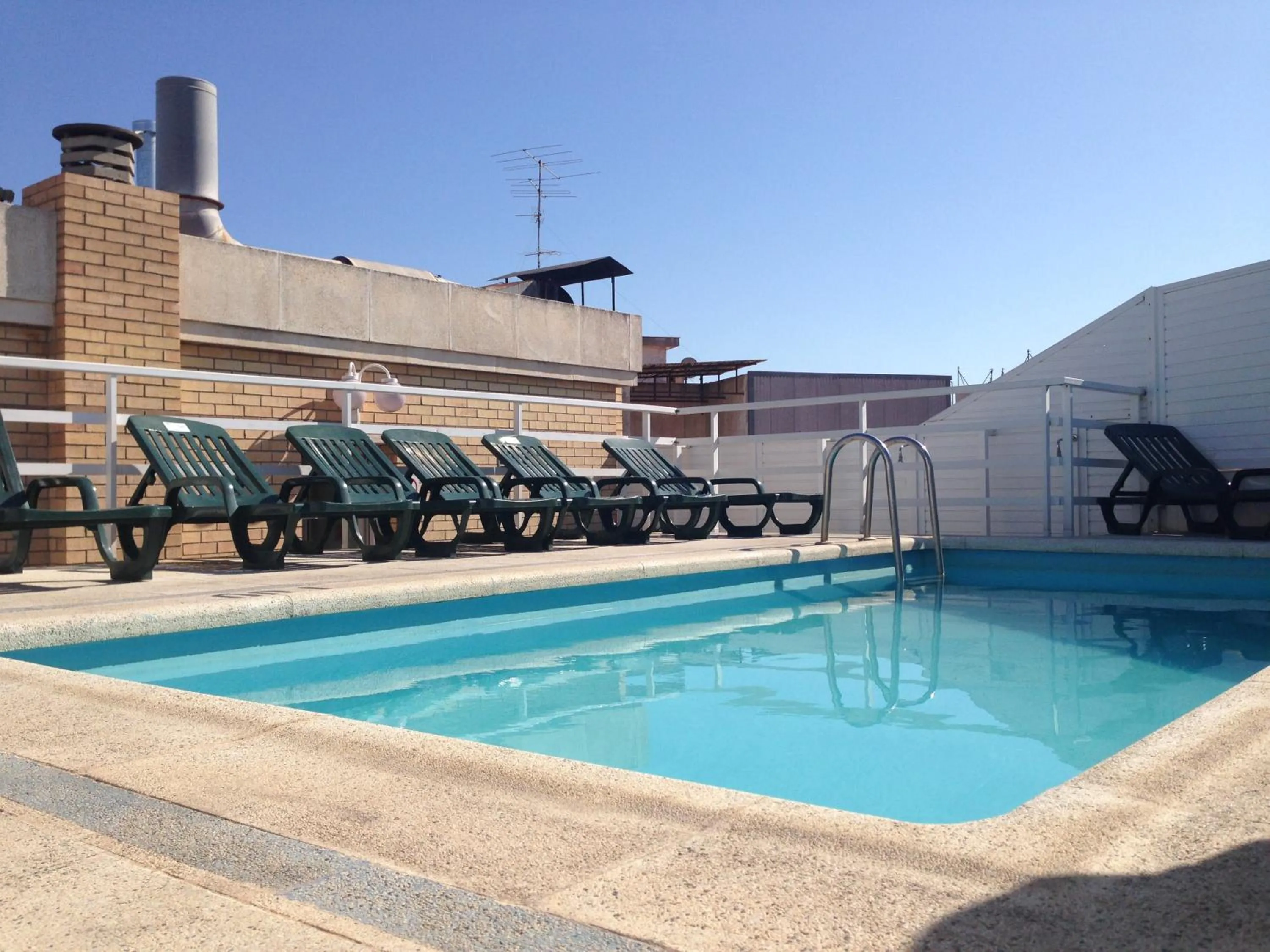 Swimming pool in Apartamentos Santi