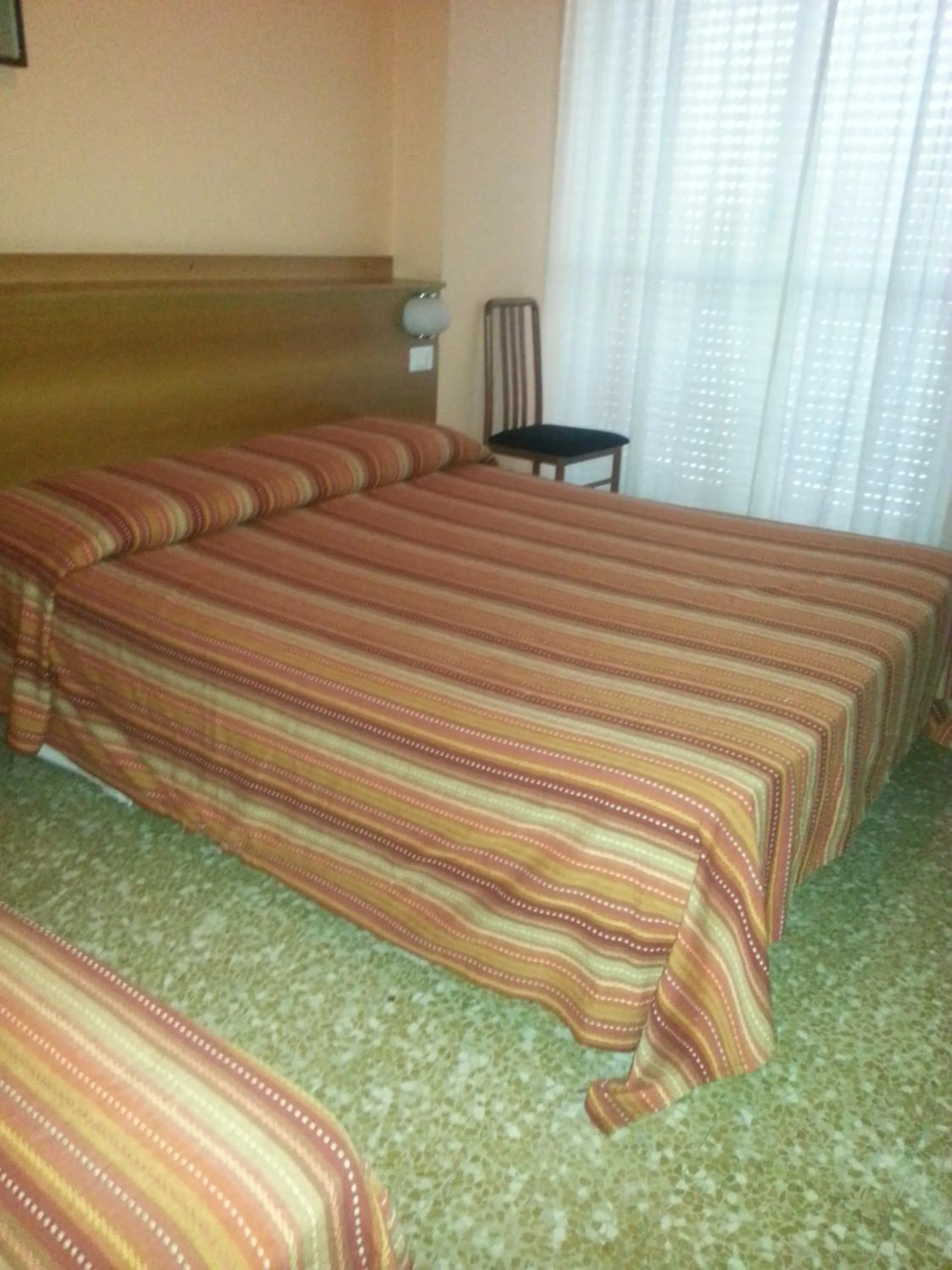 Bed in Hotel Lombardia