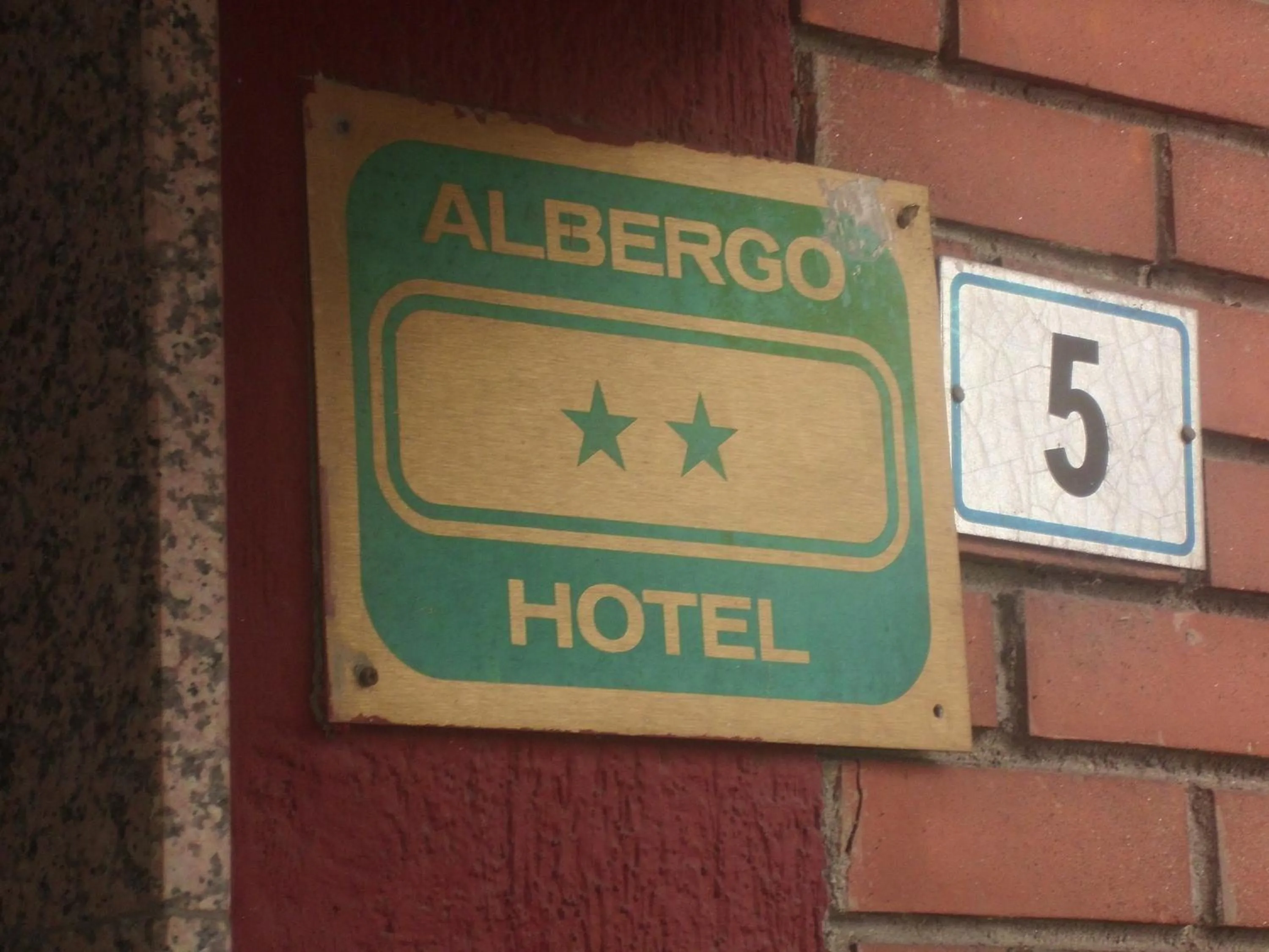 Property logo or sign in Hotel Lombardia