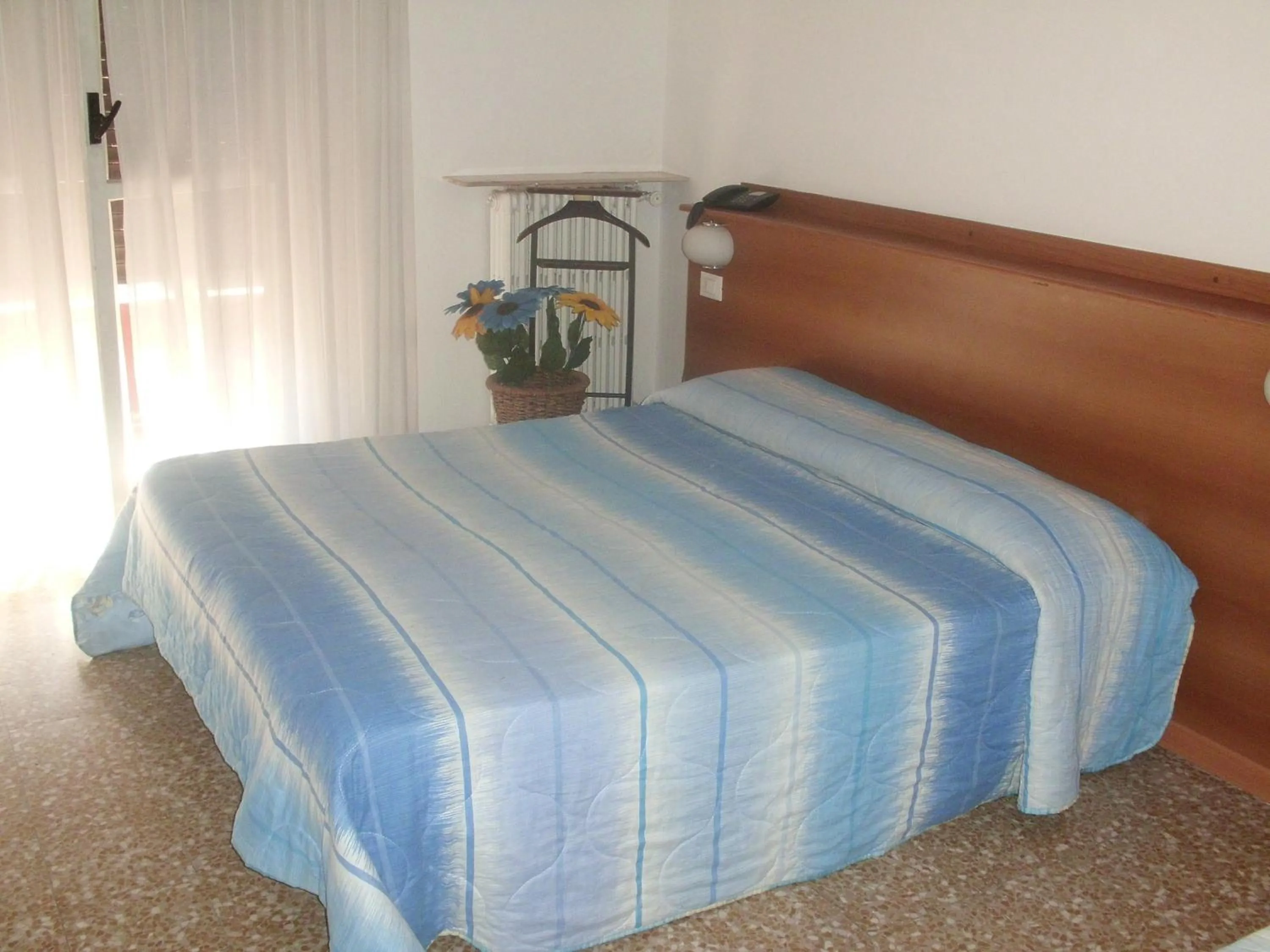 Bed in Hotel Lombardia