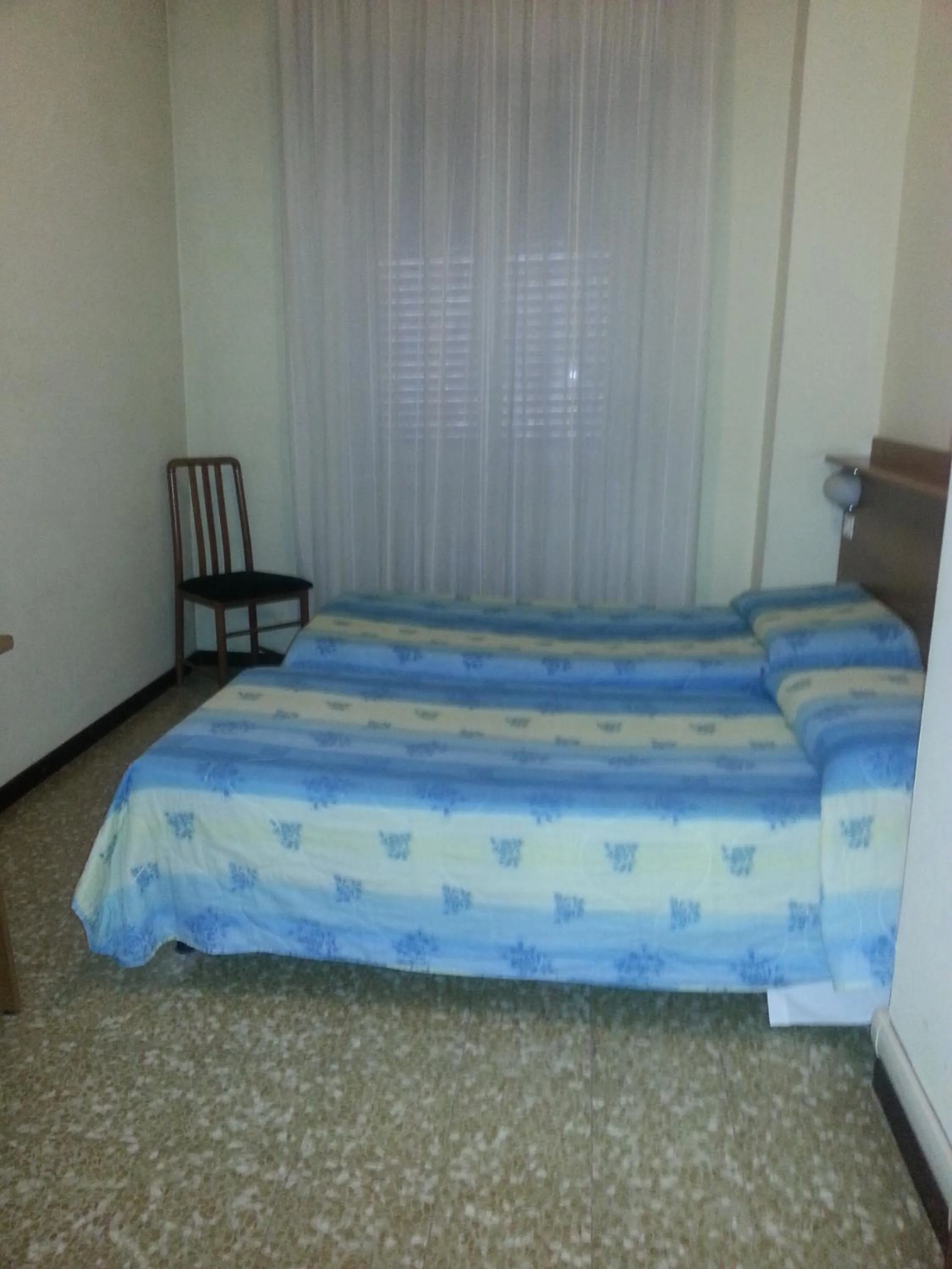 Bed in Hotel Lombardia