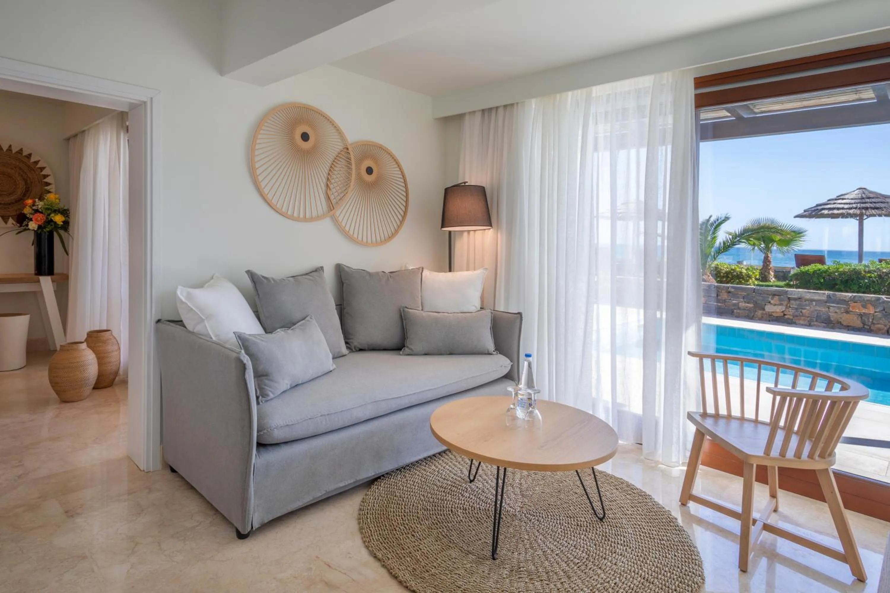 Living room in Blue Sea Beach Affiliated By Melia