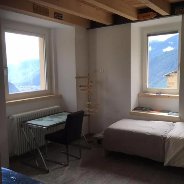 Bed in Foresteria B&B Vecchiascuola Pianazzola