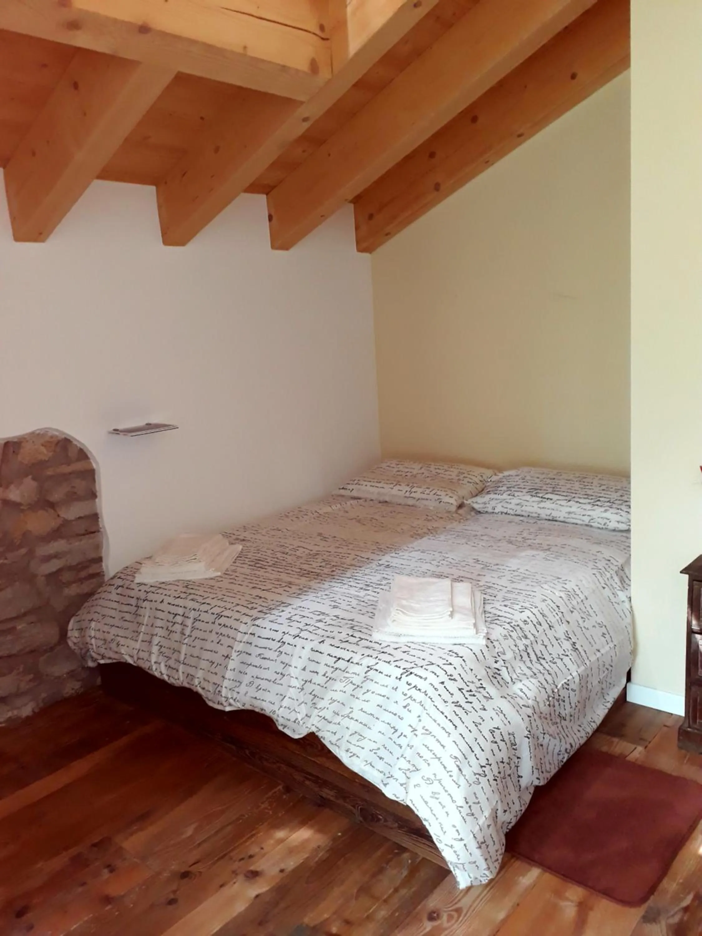 Bed in Foresteria B&B Vecchiascuola Pianazzola