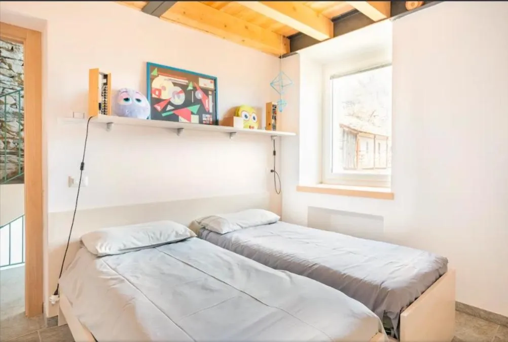 Bed in Foresteria B&B Vecchiascuola Pianazzola