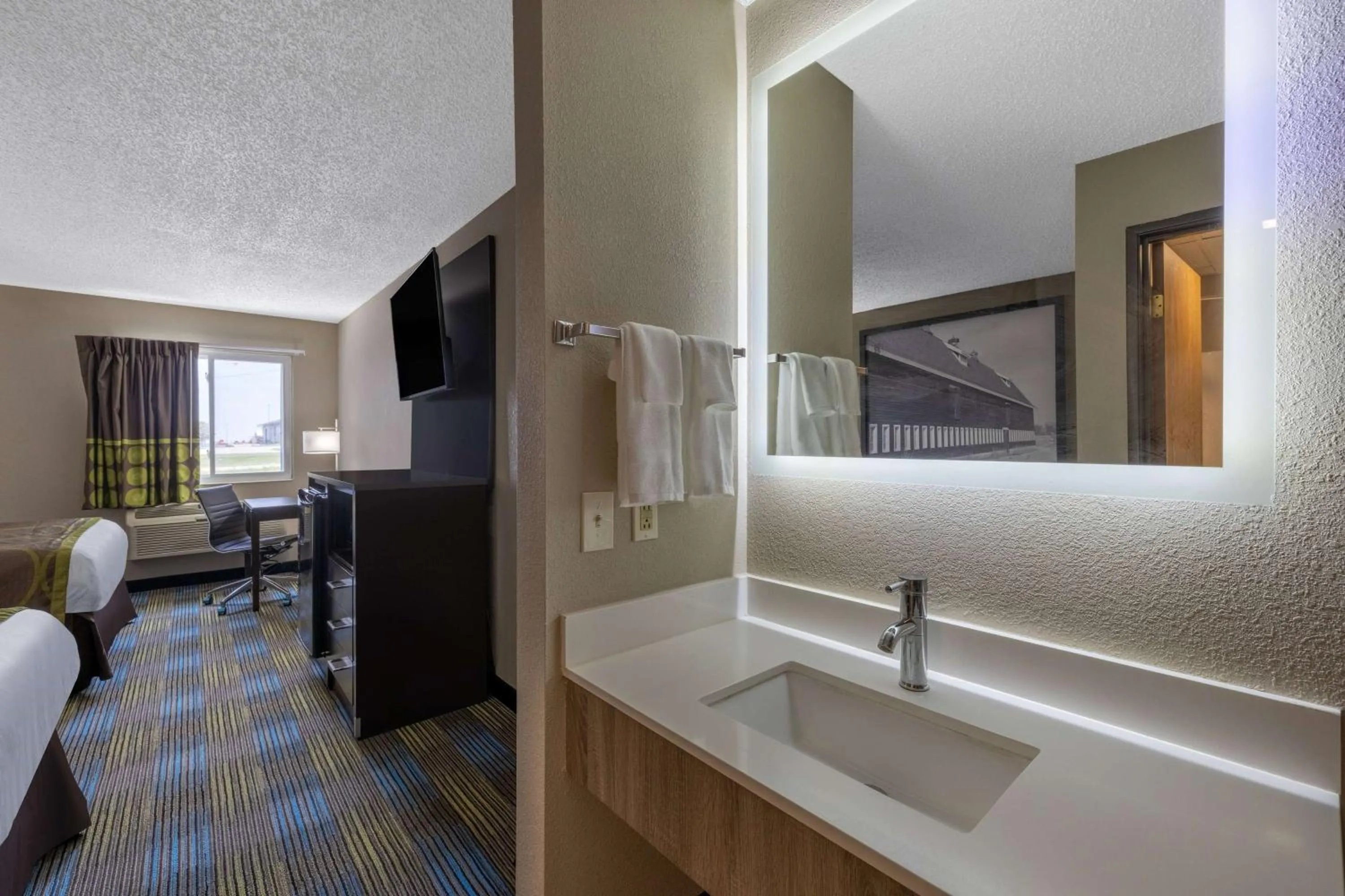 Bathroom, Bed in Super 8 by Wyndham Omaha SW