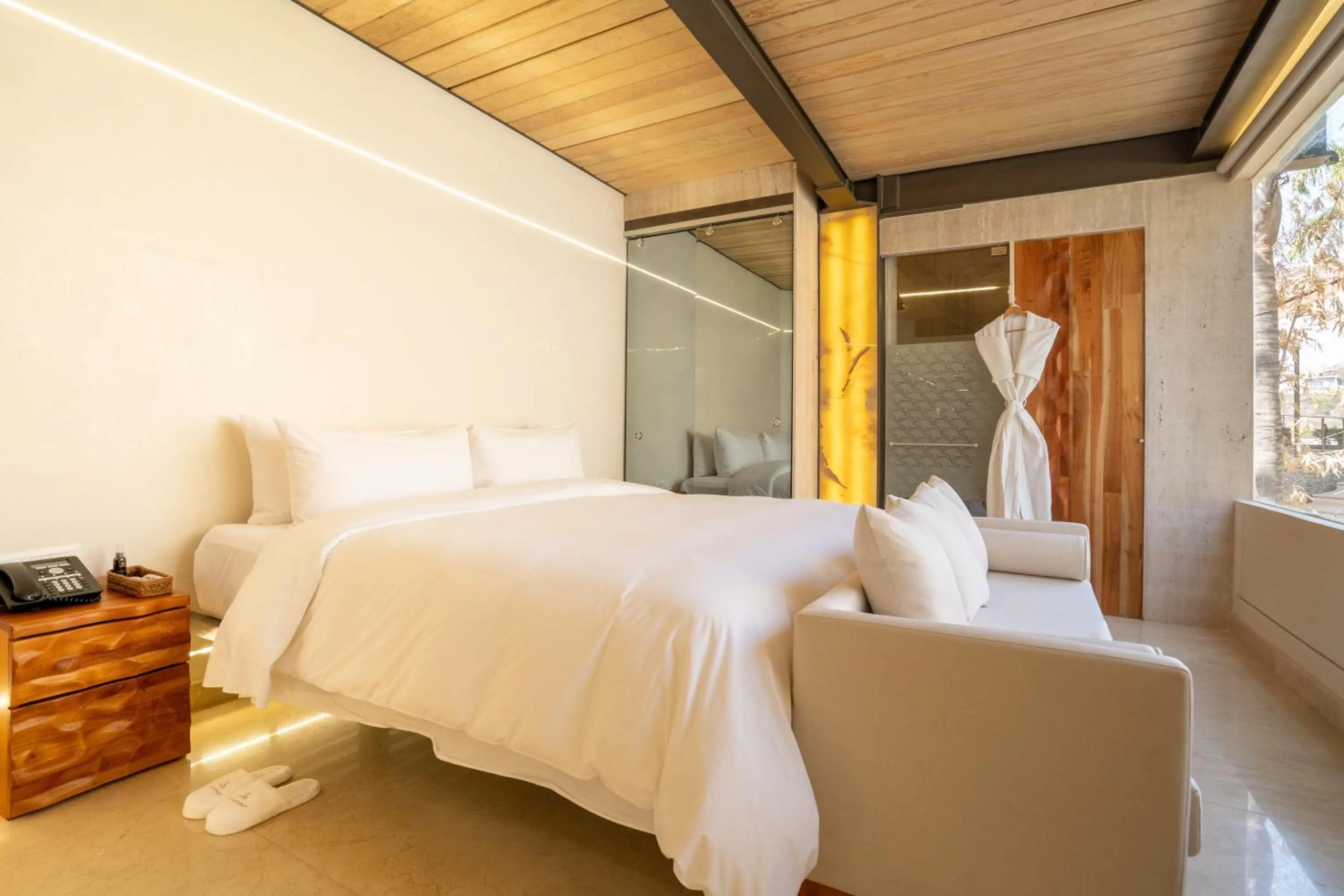 Bed in El Santuario Resort & Spa