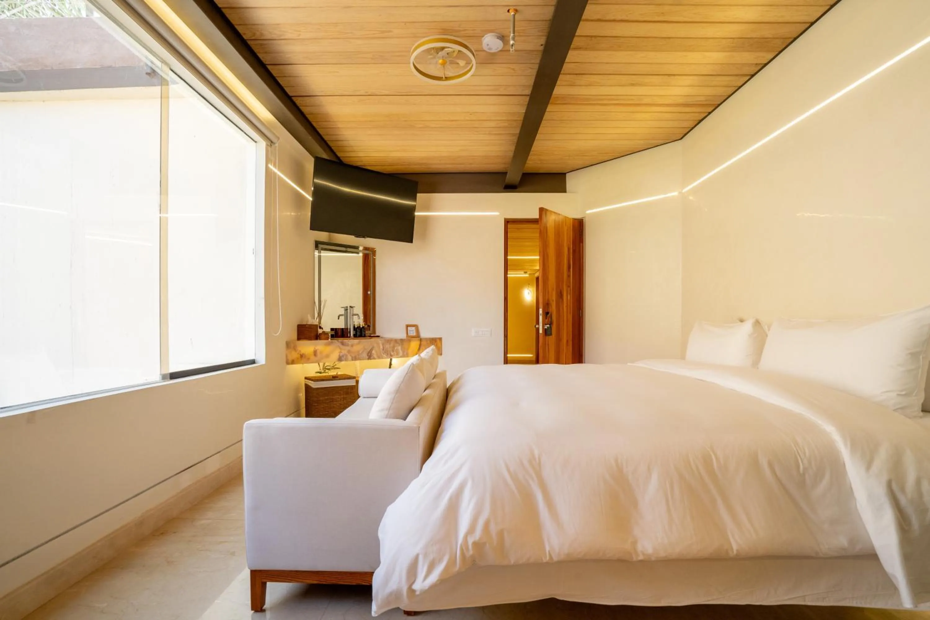 Bed in El Santuario Resort & Spa