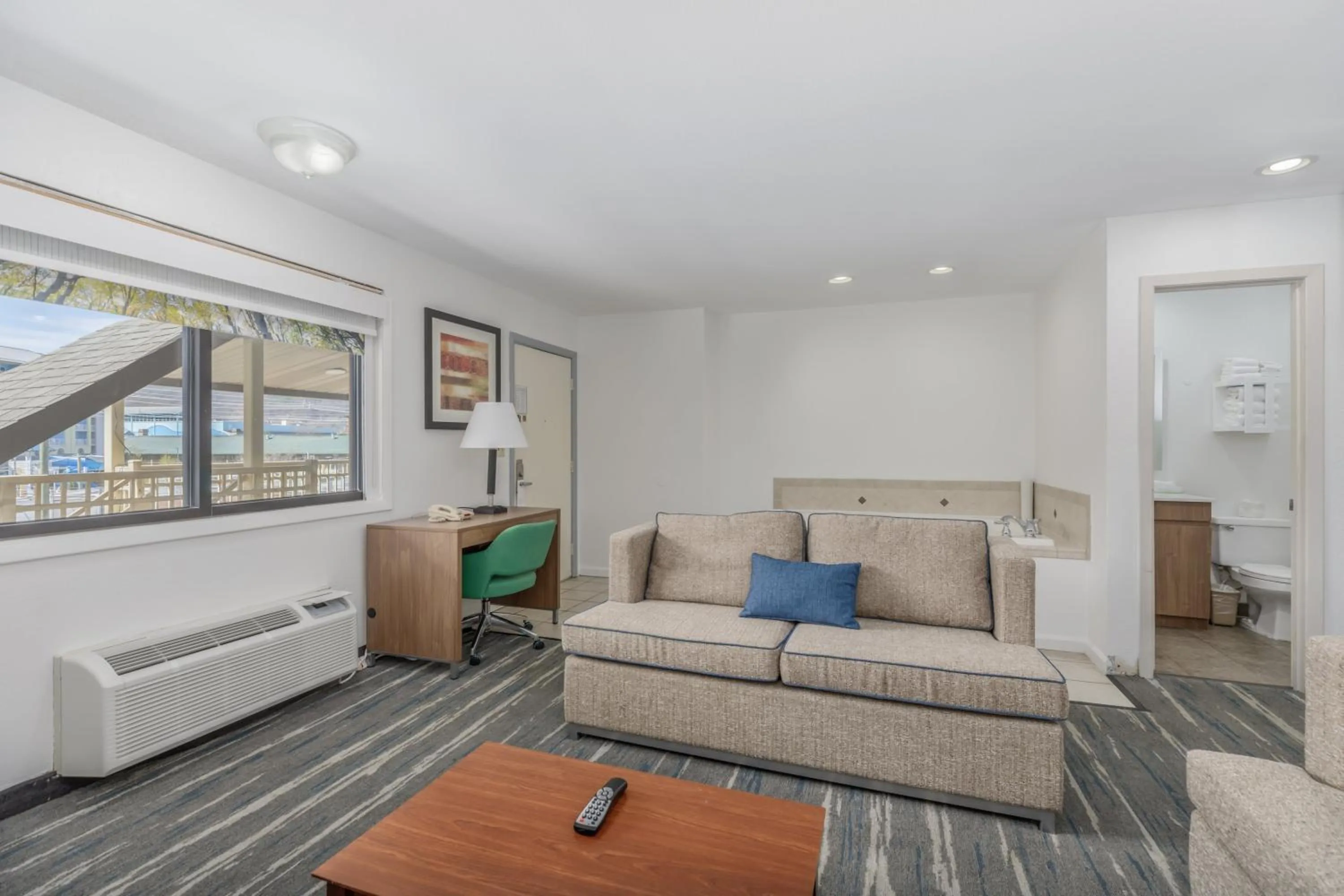 Living room in Crossroads Inn & Suites