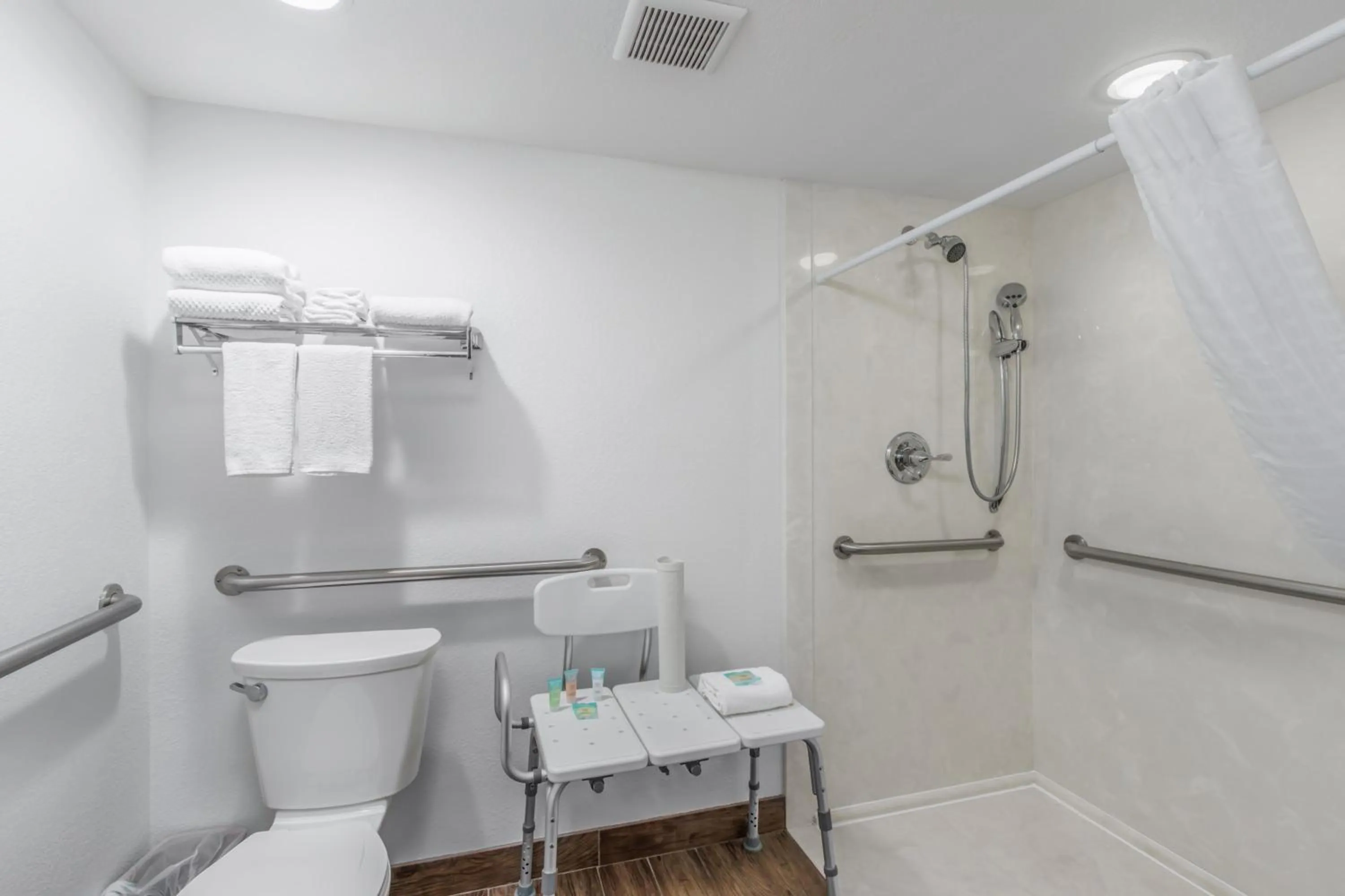 Shower in Crossroads Inn & Suites