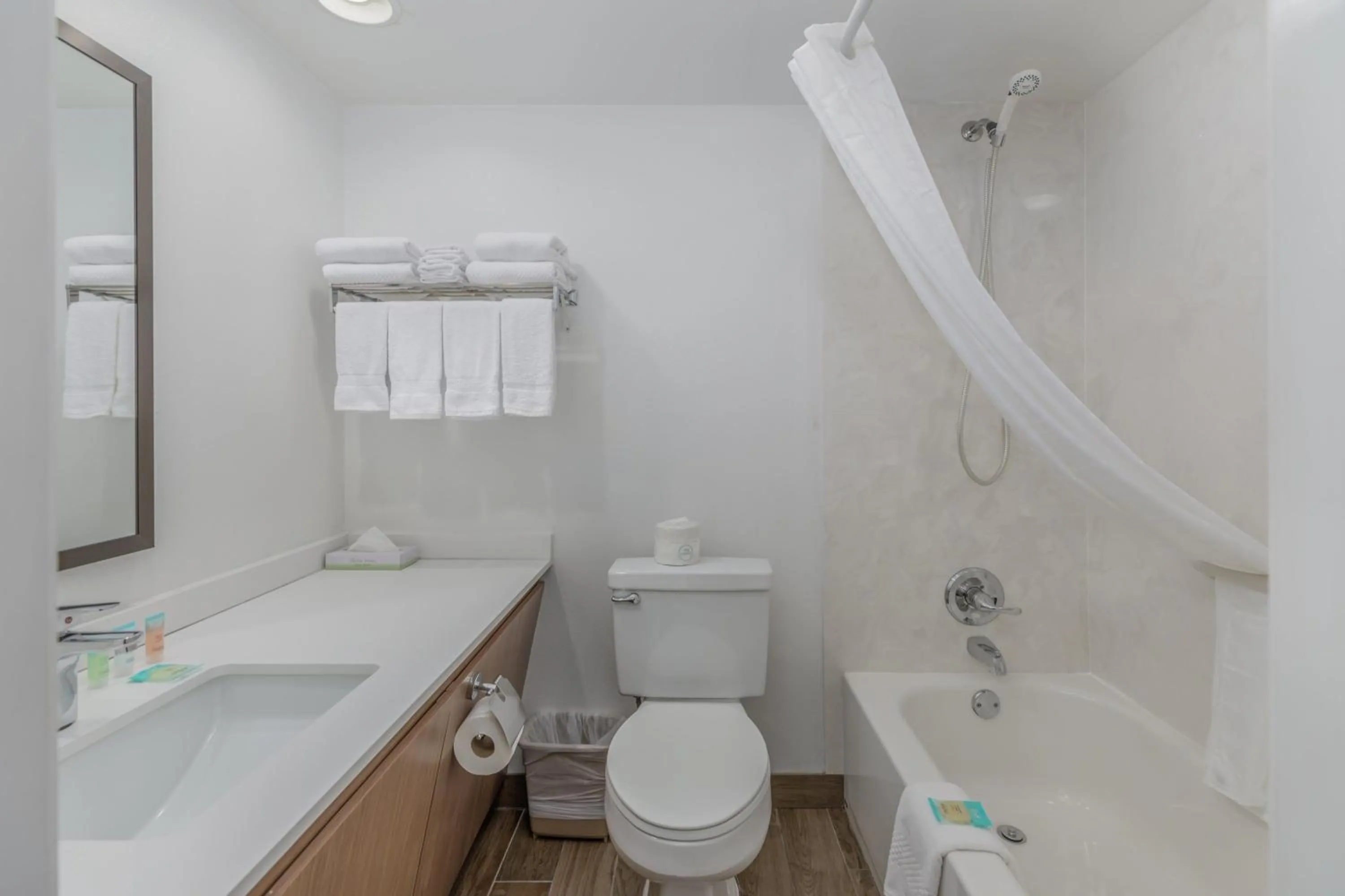 Shower in Crossroads Inn & Suites