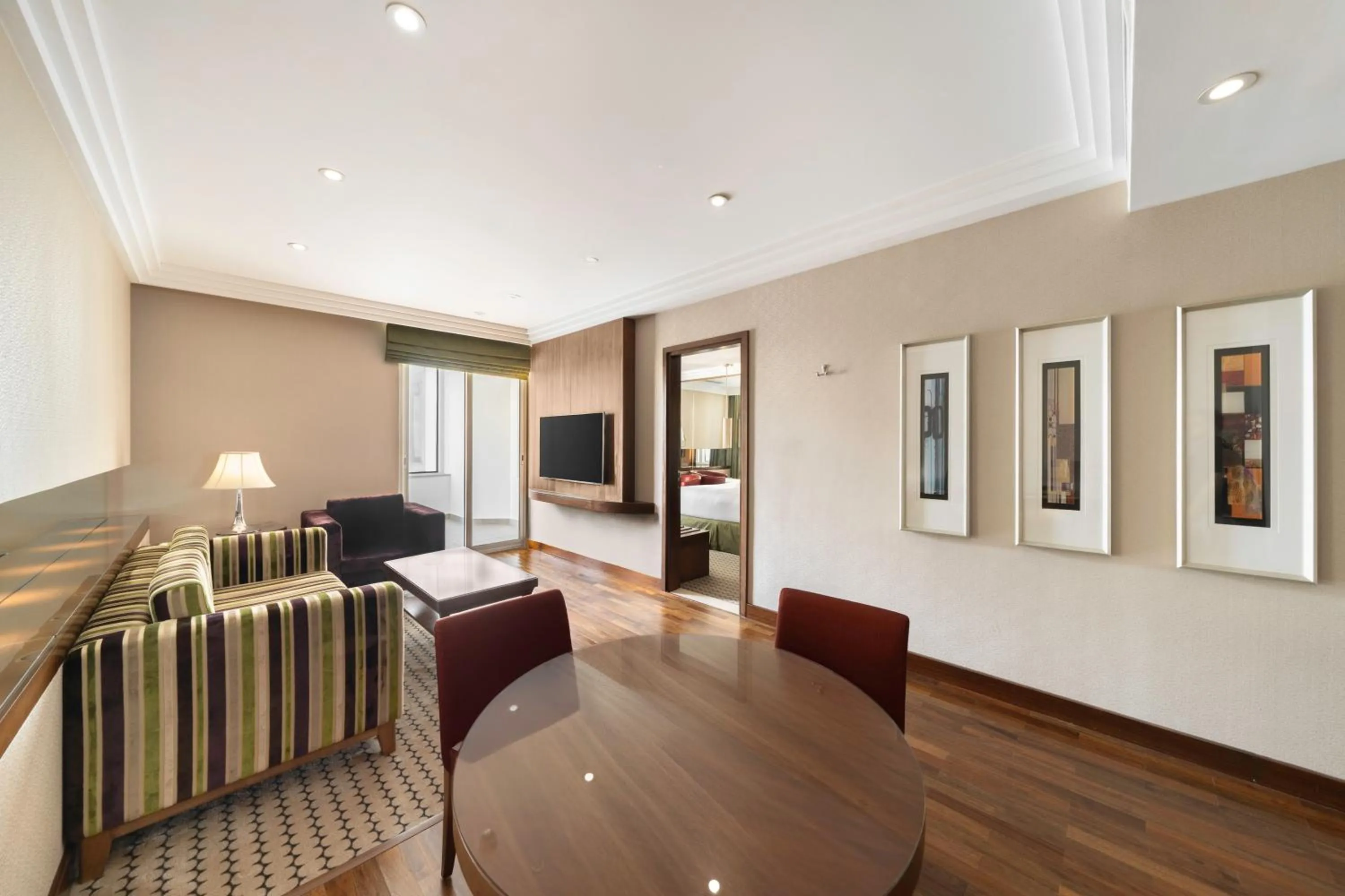 Living room, Bed in Crowne Plaza Hotel Riyadh Minhal, an IHG Hotel