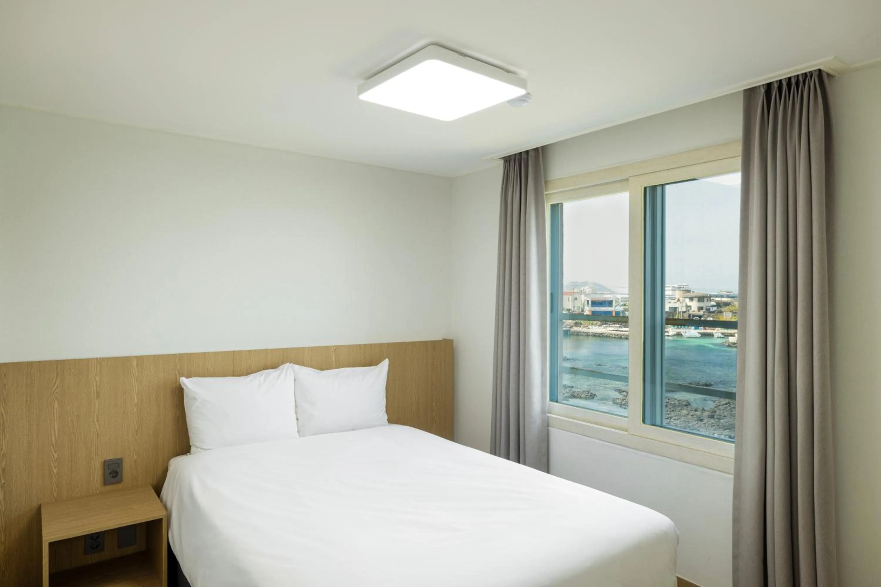 Decorative detail, Bed in Kensington Resort Jeju Hanlim